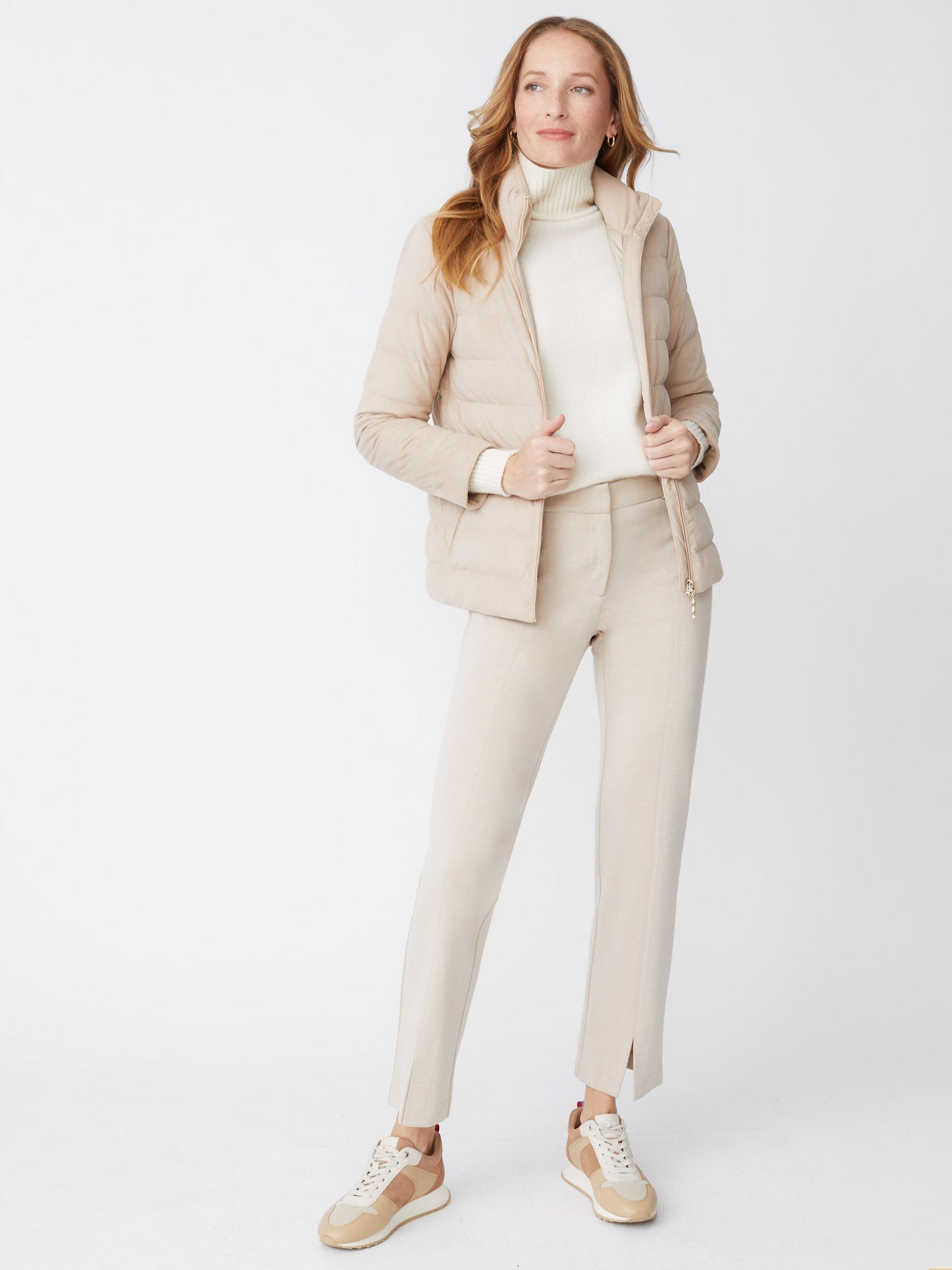 Model wearing J.McLaughlin Deanne pants in heather sand made with Bainbridge fabric.