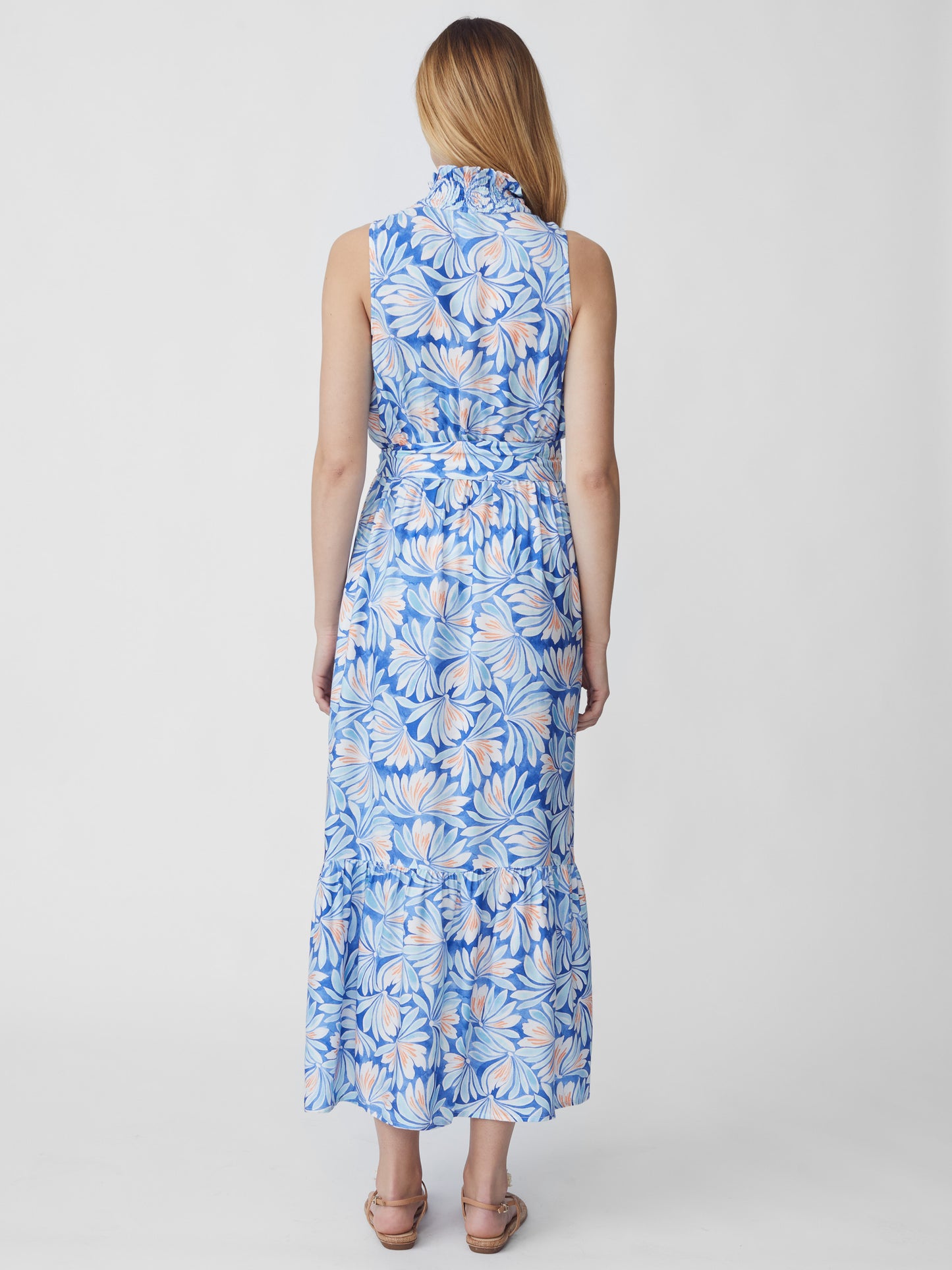 J.McLaughlin model wears Soiree Dress in Flora Fantastique in Dark Blue/Aqua made with Viscose and Silk.
