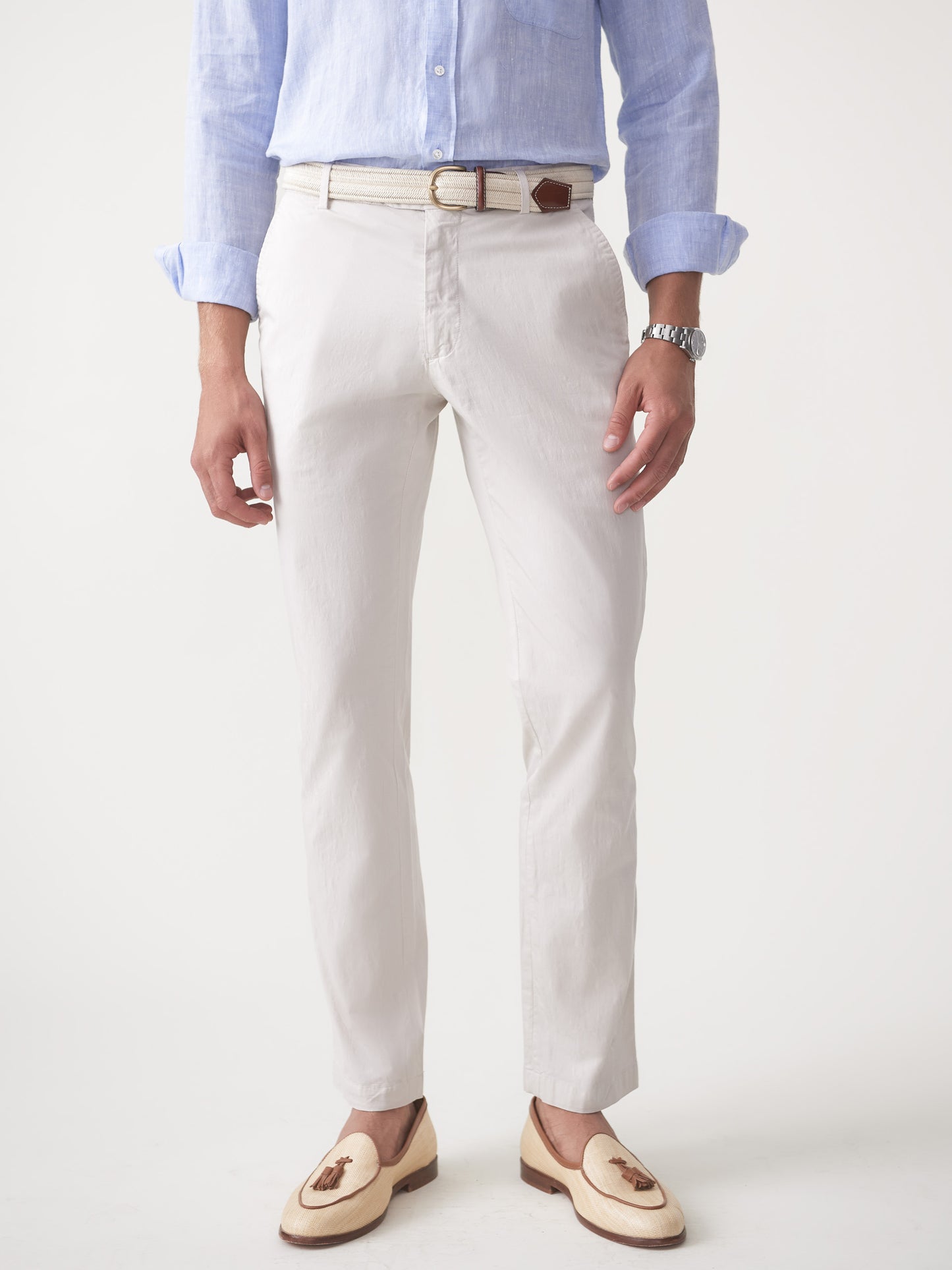 Model wearing J.McLaughlin Taylor pants in stone made with cotton/spandex.