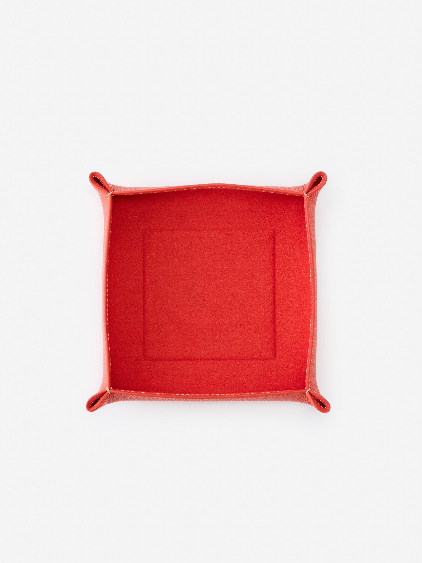 J.McLaughlin Trinket tray in orange made with leather.
