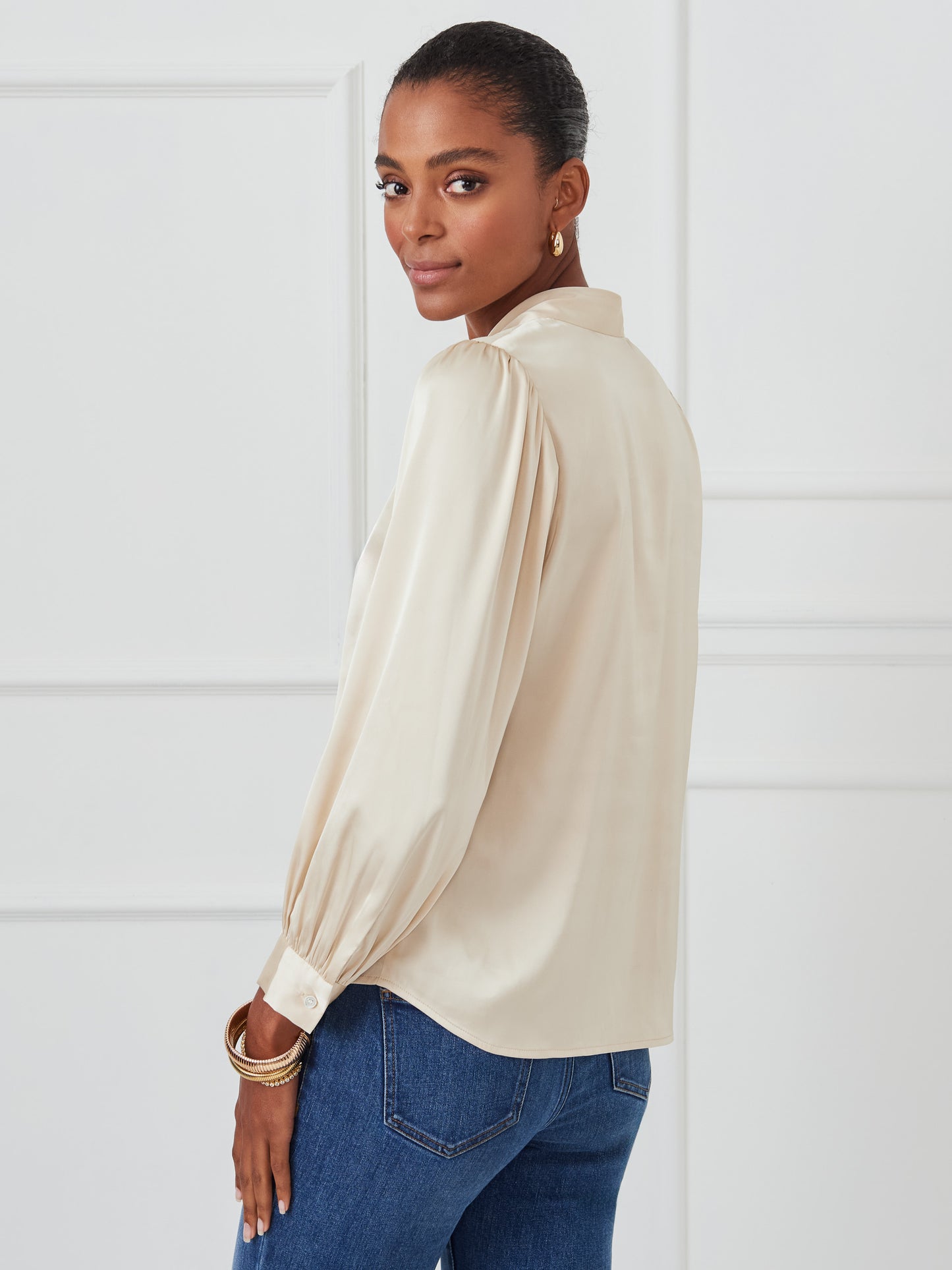 J.McLaughlin Vienna top in champagne made with polyester.