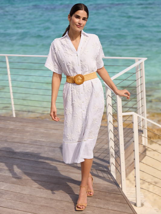 Model wearing J.McLaughlin Anamaria dress in white made with linen and cotton.
