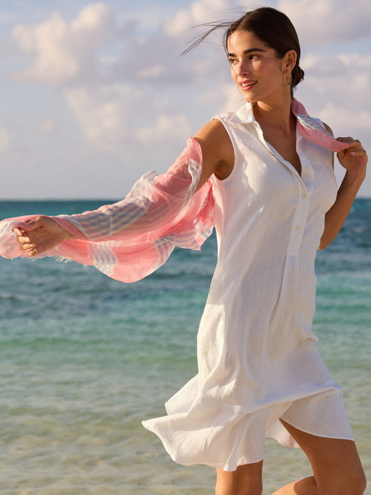 Model wearing J.McLaughlin Wellesley sleeveless dress in white made with linen.