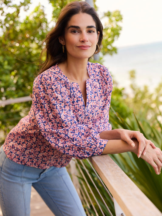J.McLaughlin model wears Georgette Blouse in Mini Botanica in navy/red made with ramie/tencel.