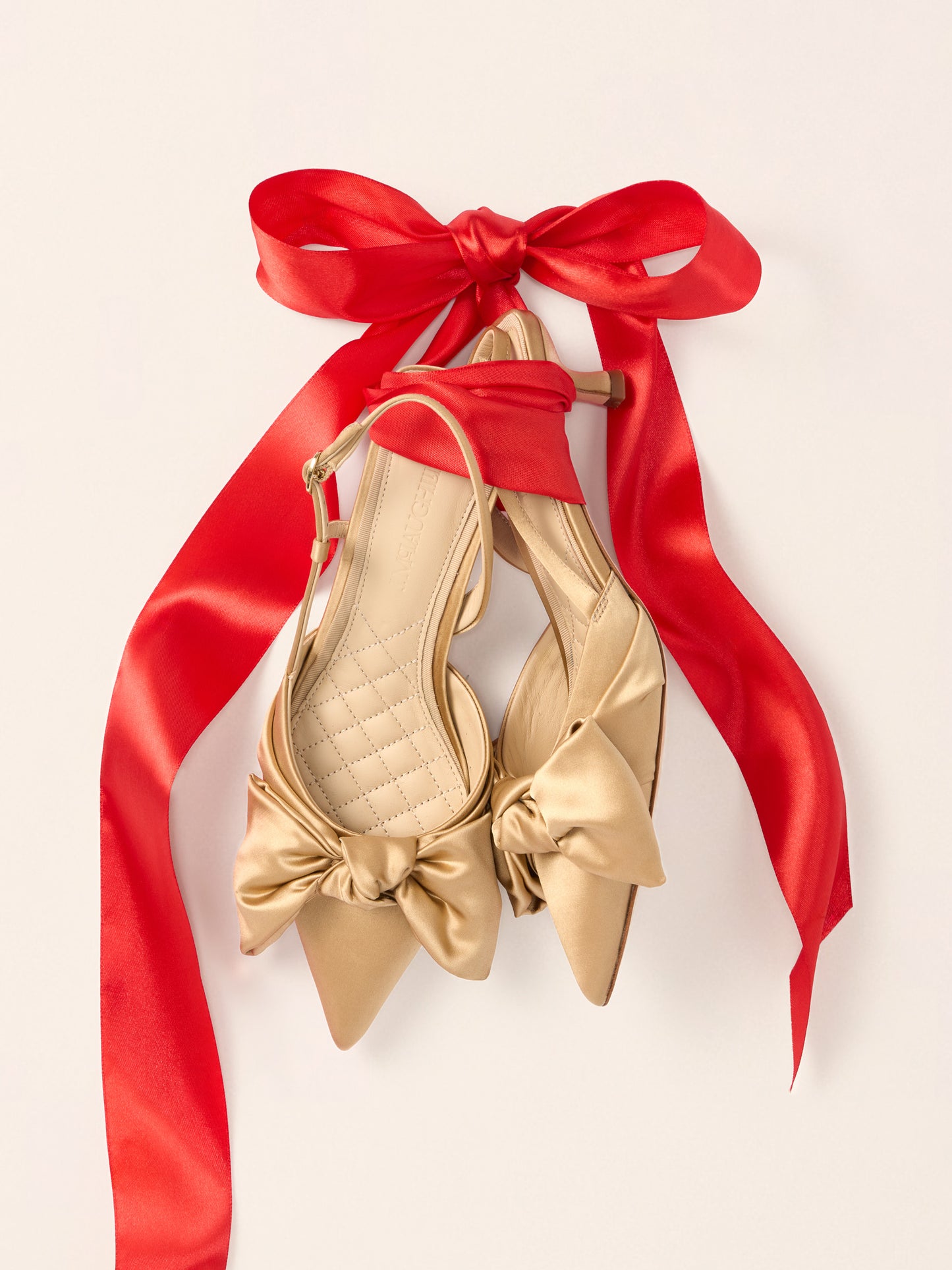 J.McLaughlin Natasha heels inn gold charmeuse made with satin.