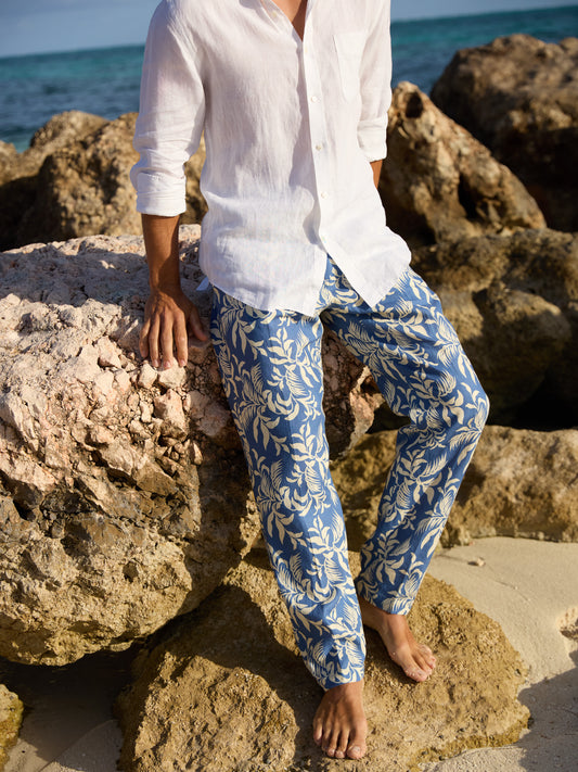 Model wearing J.McLaughlin Callister pants in medium blue/off white made with linen.