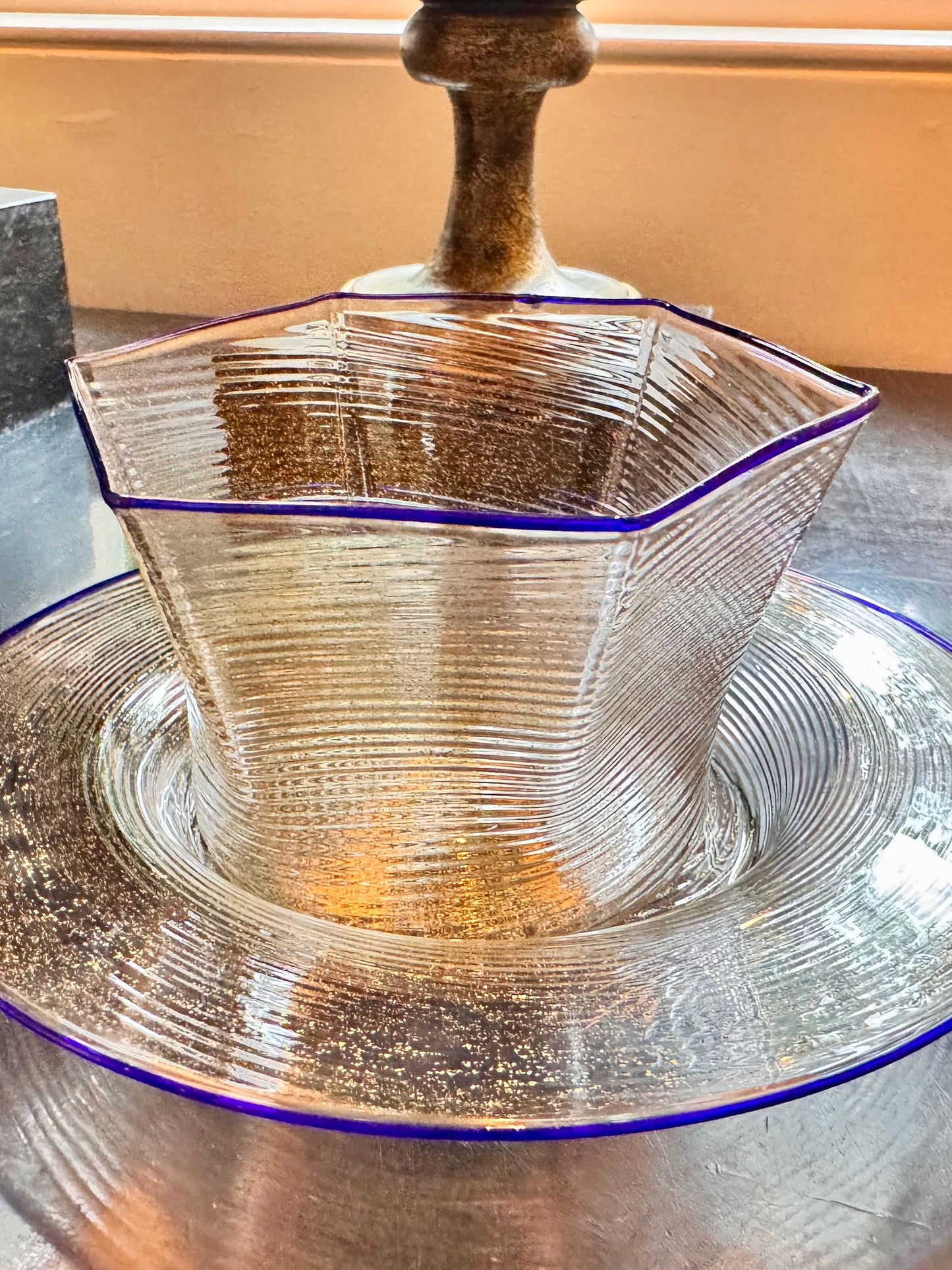 J.McLaughlin Hexagonal dessert bowl in gold leaves blue rim made with glass. 