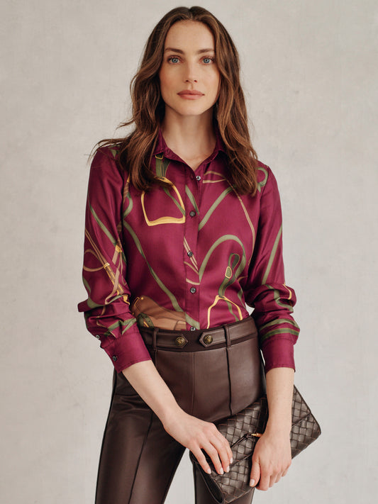 Model wearing J.McLaughlin Denver shirt in burgundy/olive made with silk and viscose.