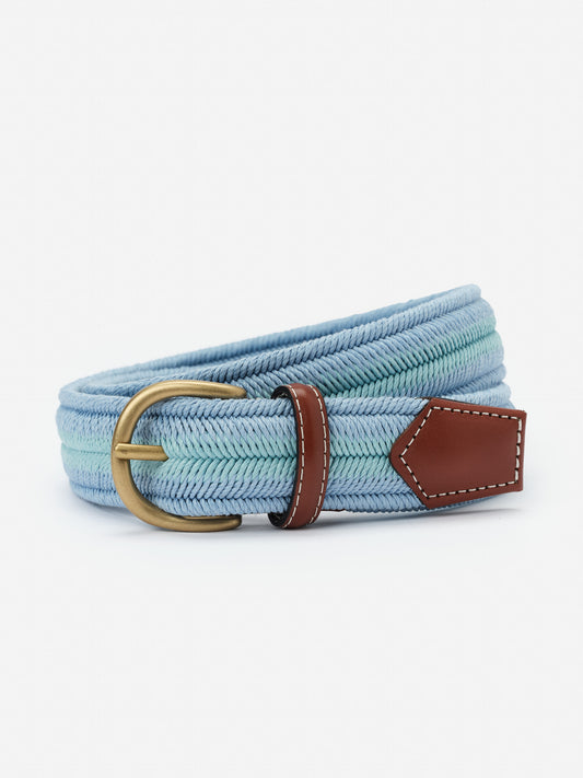 Ray Belt in Stripe by J.McLaughlin features a woven blue and green fabric with a gold buckle and brown leather accents, blending classic style with thoughtful craftsmanship.