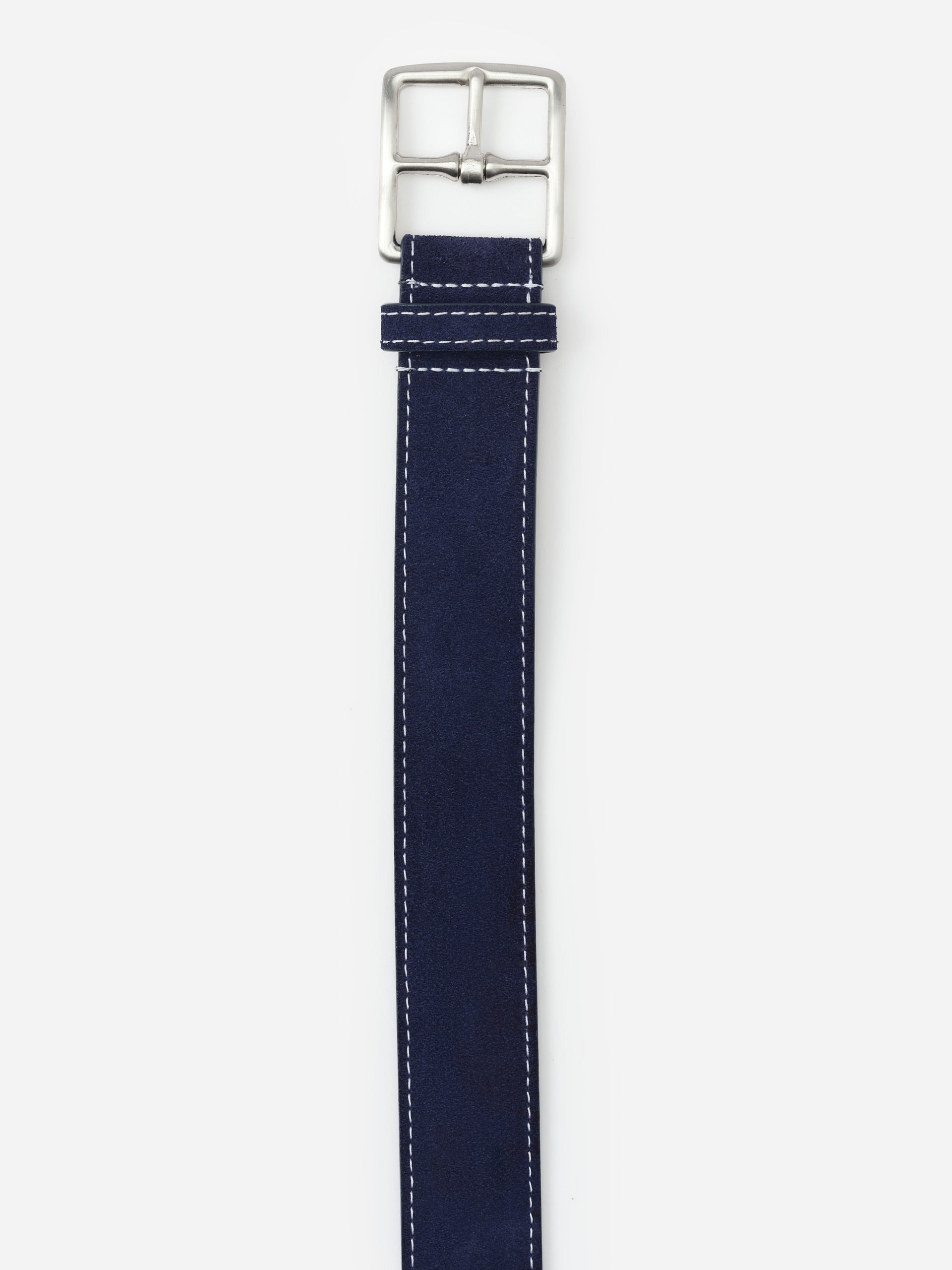 Navy suede belt with silver buckle and white stitching by J. McLaughlin, showcasing effortlessly stylish, enduring designs and innovative fabrics for a legacy of timeless fashion. A destination for defining style. Life, Well-Lived.