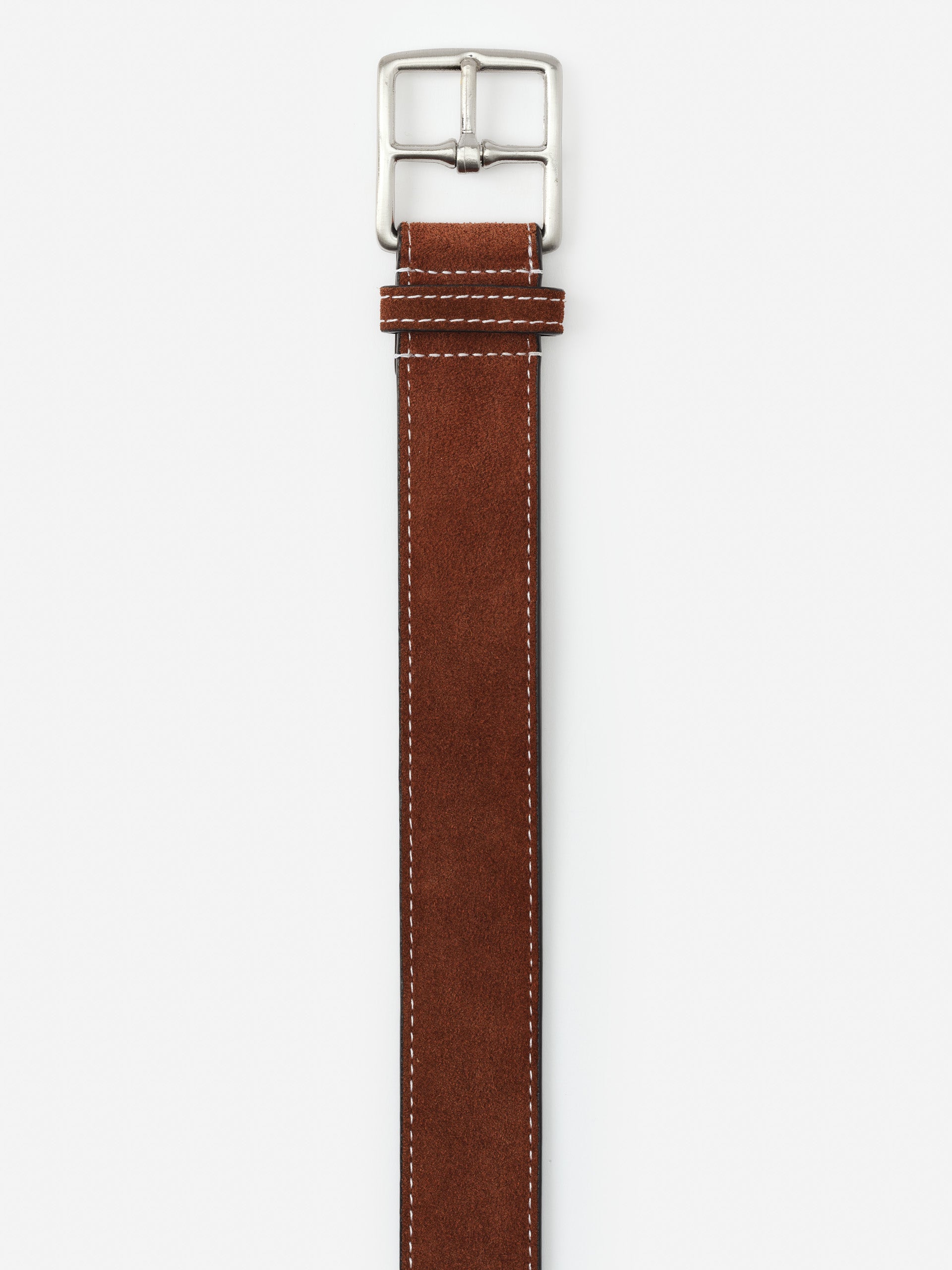 Brown suede belt with silver buckle by J.McLaughlin, showcasing effortlessly stylish craftsmanship and enduring design from a destination for defining style. Life, Well-Lived.