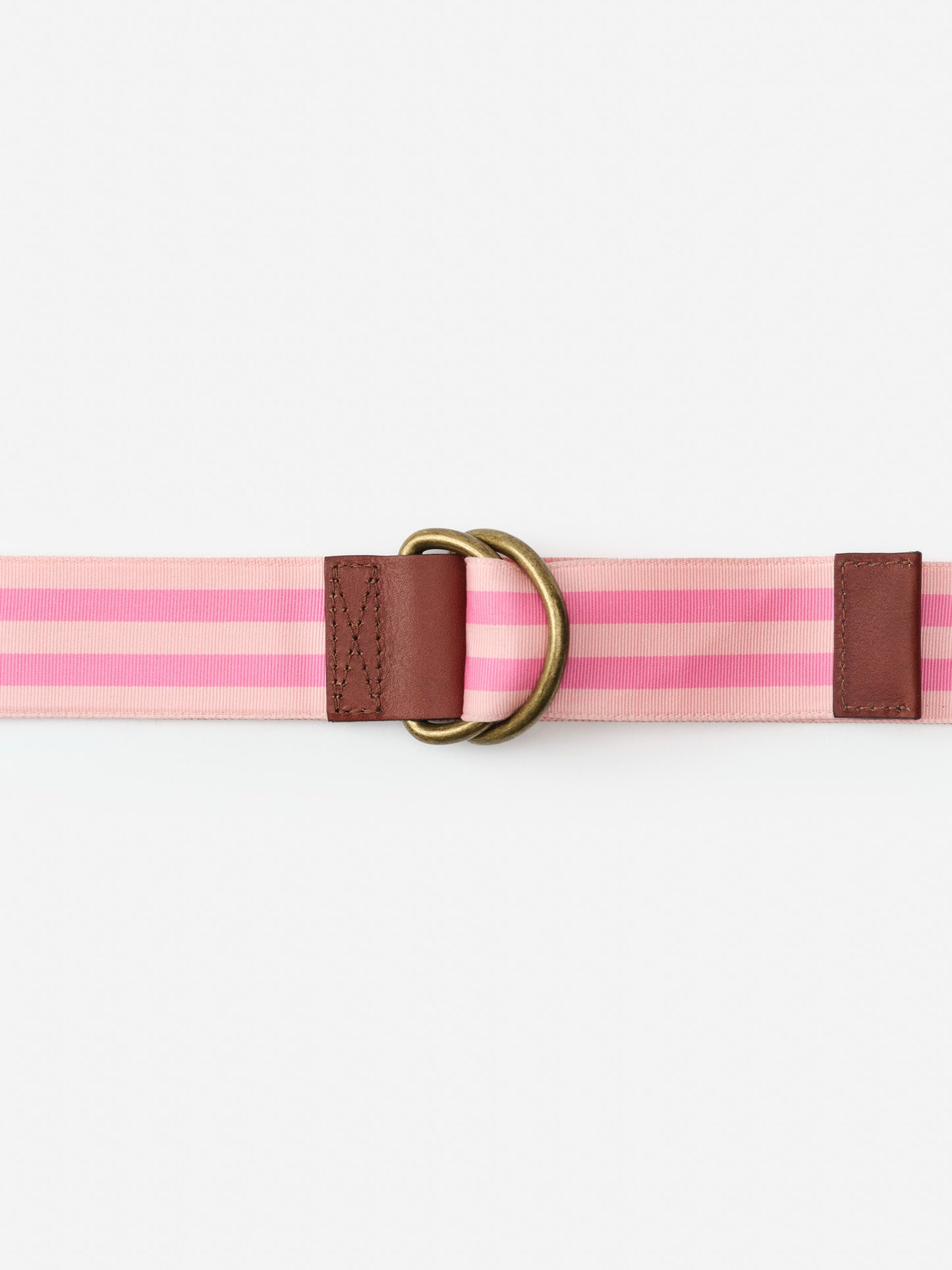 Ribbon Belt in Stripe featuring pink stripes and brown leather accents with brass hardware, embodying J.McLaughlin’s effortlessly stylish, enduring designs for a life well-lived.