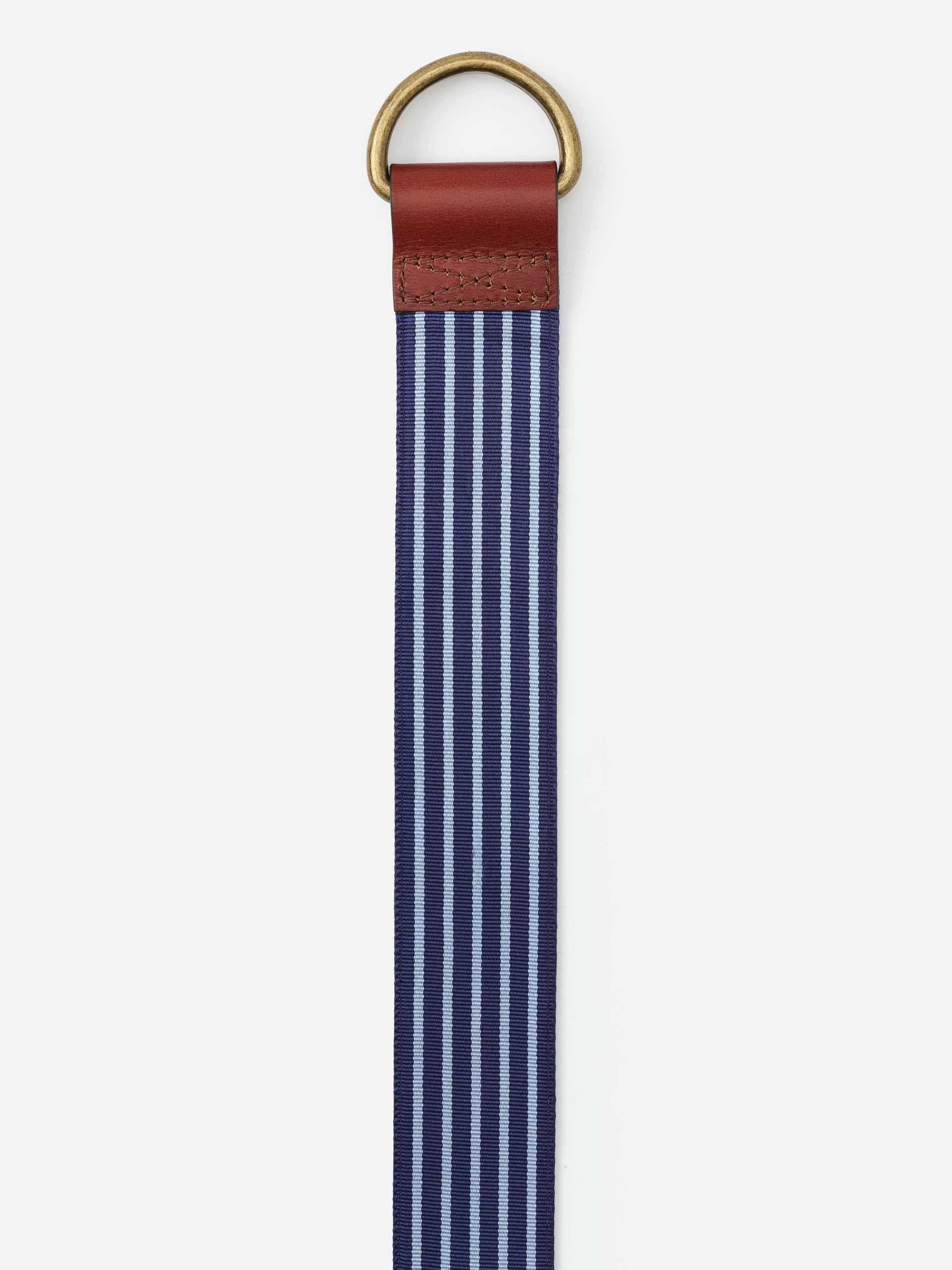 Ribbon Belt in Stripe by J.McLaughlin featuring classic navy and light blue stripes with a leather accent and brass ring, showcasing effortlessly stylish, enduring designs.