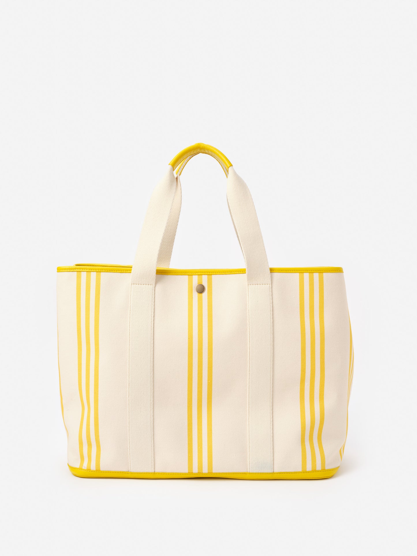 Alma Canvas Tote in Stripe by J.McLaughlin, an effortlessly stylish bag featuring yellow stripes on durable canvas, reflecting enduring designs and a legacy of timeless fashion. A destination for defining style. Life, Well-Lived.