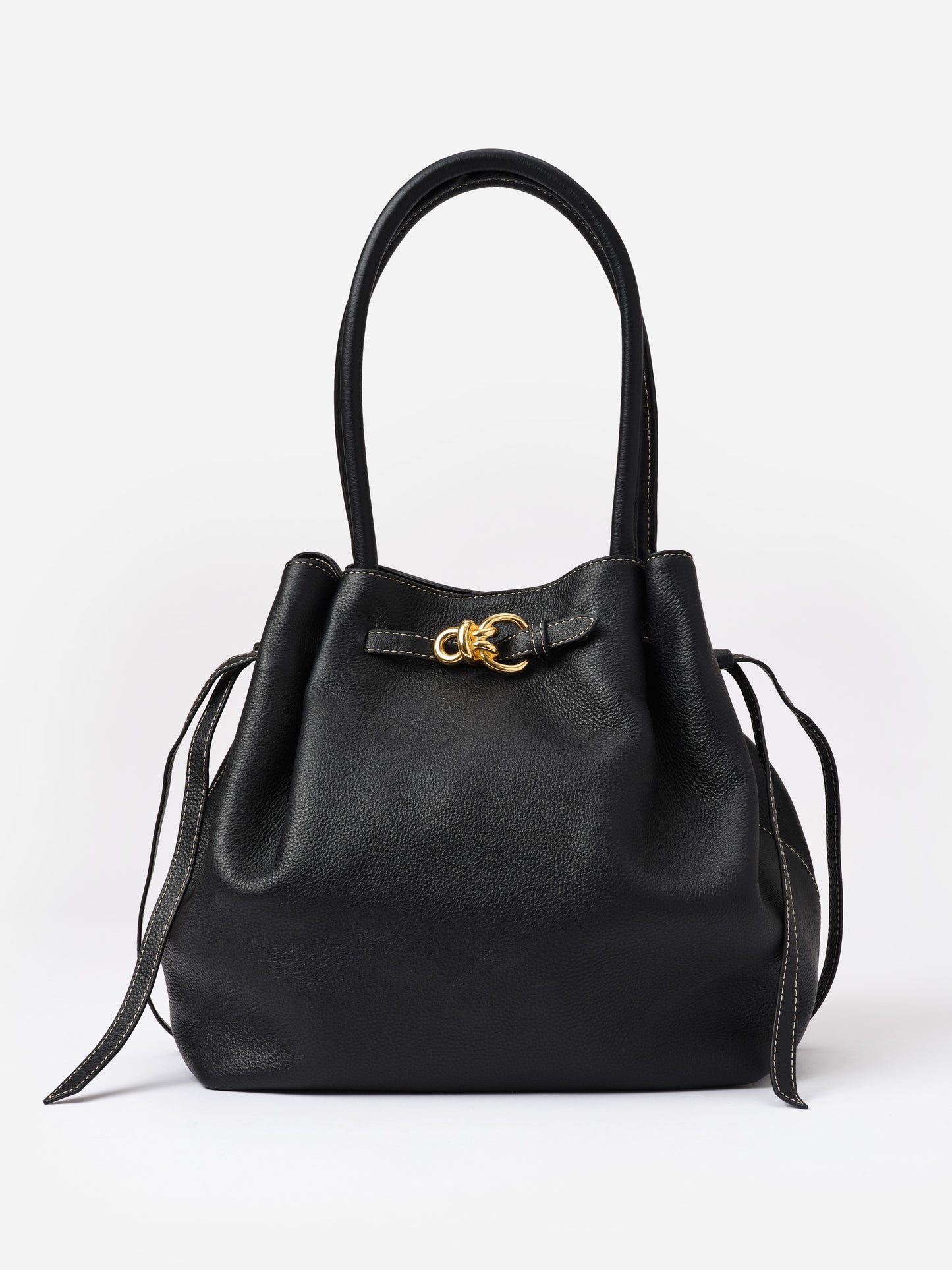 The Lex Leather Tote Bag by J.McLaughlin in black leather with gold hardware, featuring a spacious design and classic craftsmanship for timeless style.