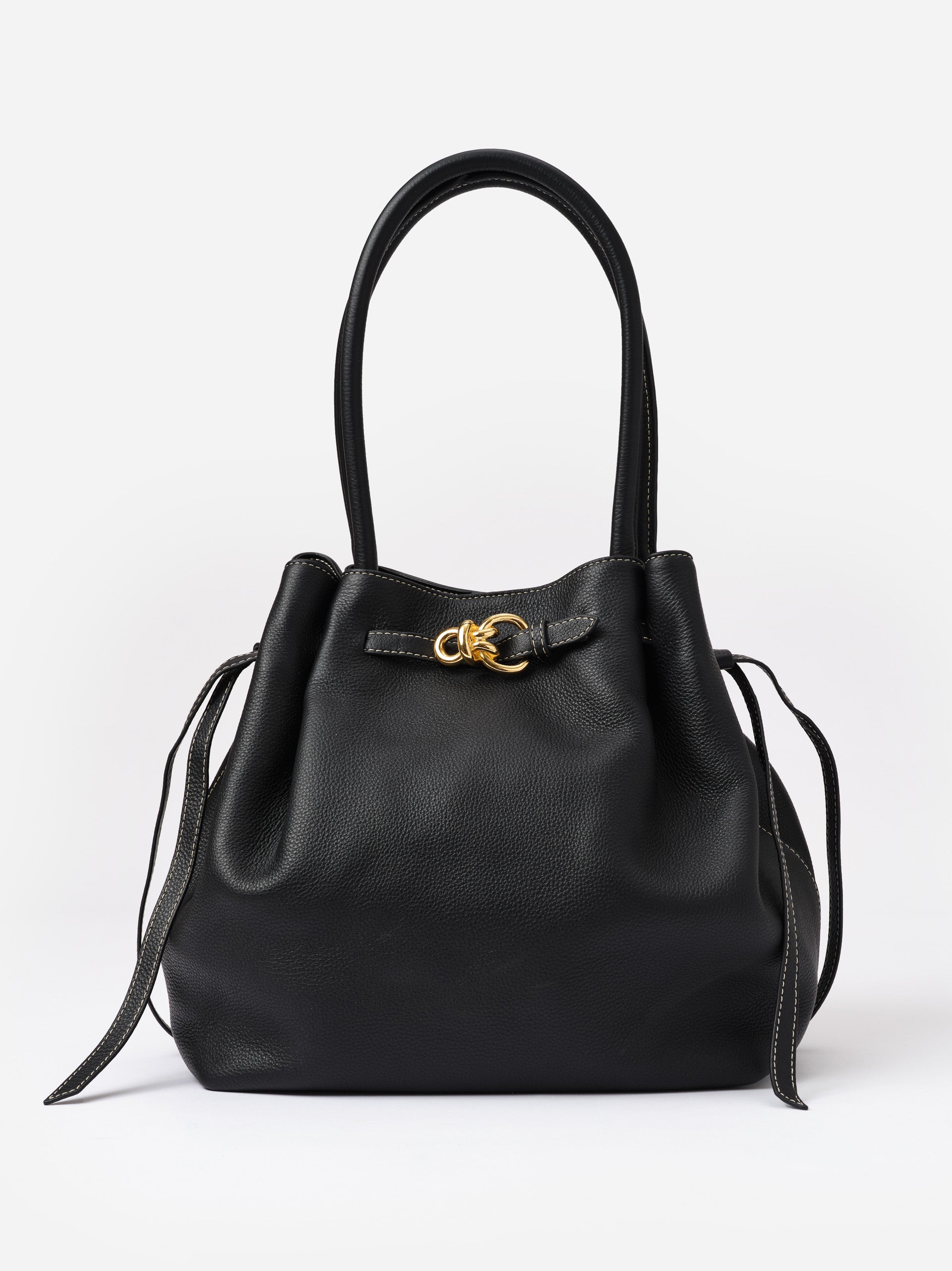 The Lex Leather Tote Bag by J.McLaughlin in black leather with gold hardware, featuring a spacious design and classic craftsmanship for timeless style.