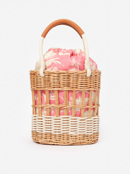 Caryl Wicker Handbag in Giardino Toile by J.McLaughlin, featuring an effortlessly stylish wicker design with a floral fabric interior, blending enduring designs and classic craftsmanship.