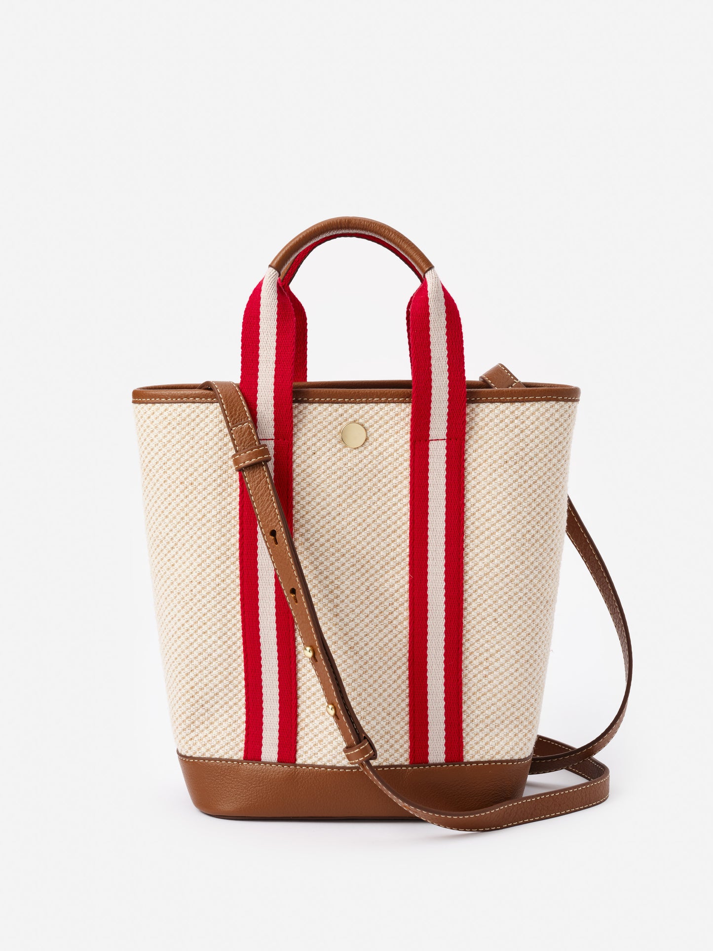 Emery Canvas Mini Tote by J.McLaughlin features a durable canvas body with bold red and white striped handles, complemented by leather trim, embodying effortlessly stylish, enduring designs in bags. A destination for defining style. Life, Well-Lived.