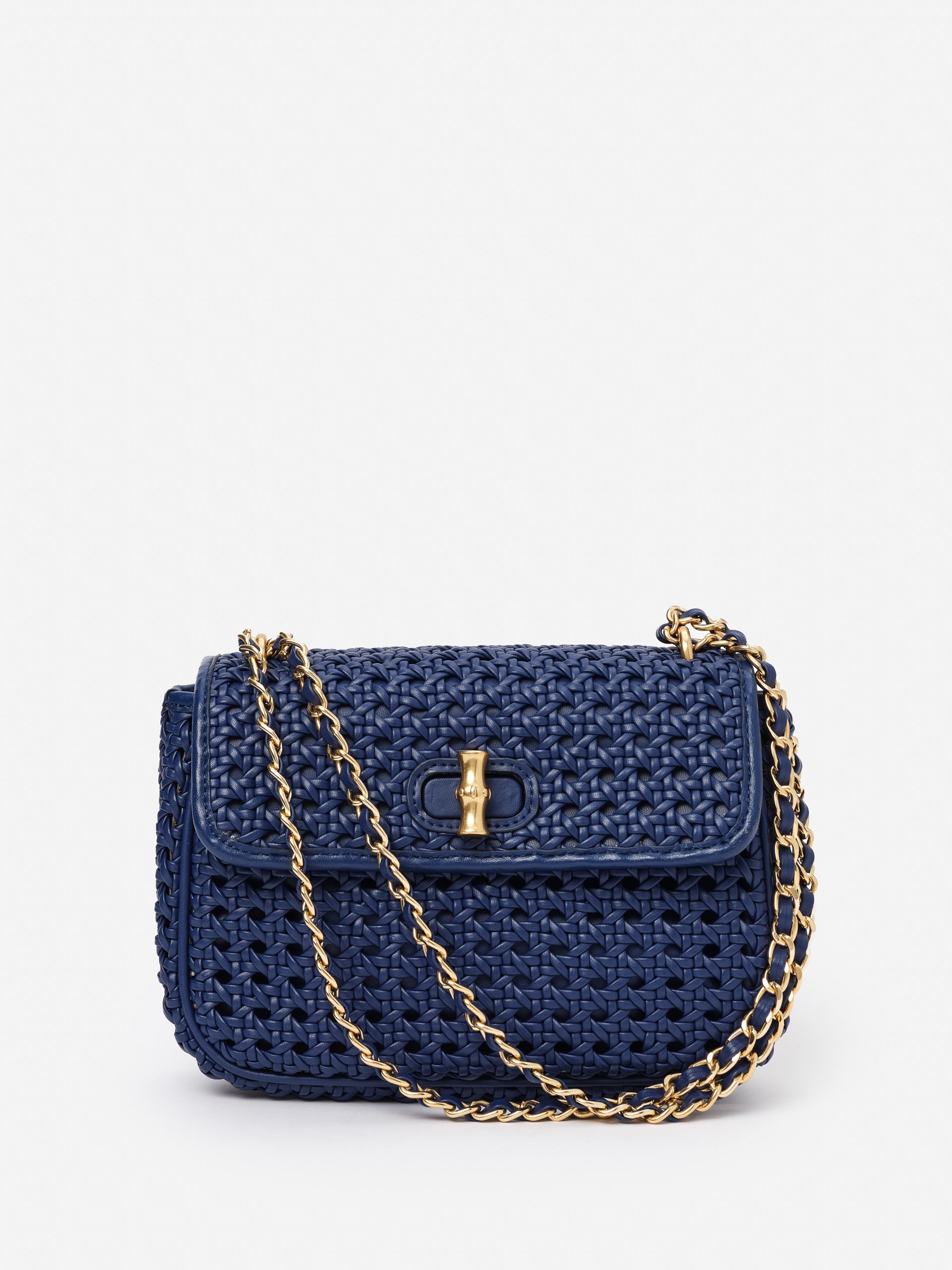 Waverly Leather Handbag by J.McLaughlin featuring a woven navy design and gold chain strap, embodying effortlessly stylish, enduring designs with a legacy of timeless fashion.