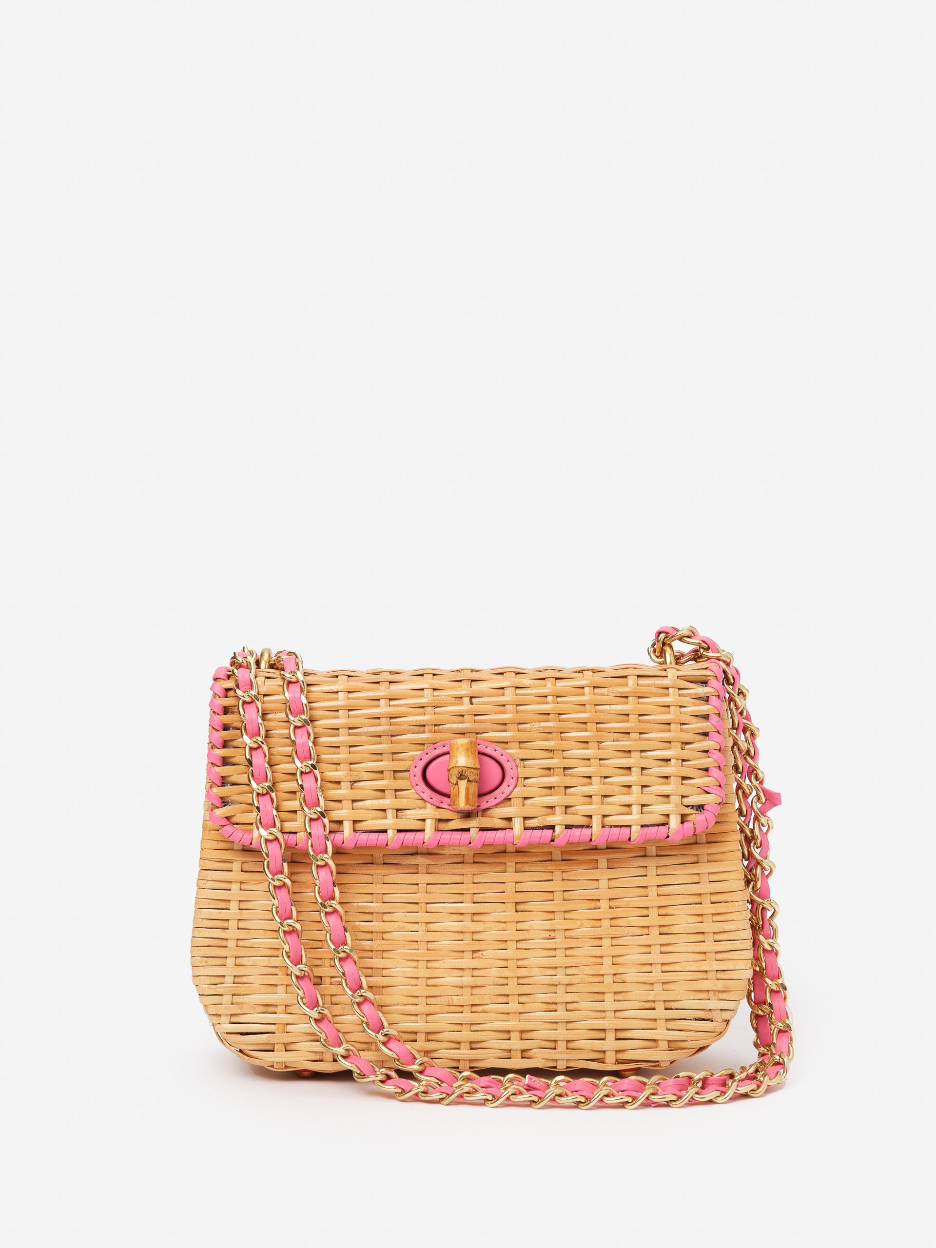 Waverly Wicker Handbag by J.McLaughlin featuring woven wicker with pink trim and chain strap, combining effortlessly stylish, enduring designs and innovative fabrics for timeless fashion.