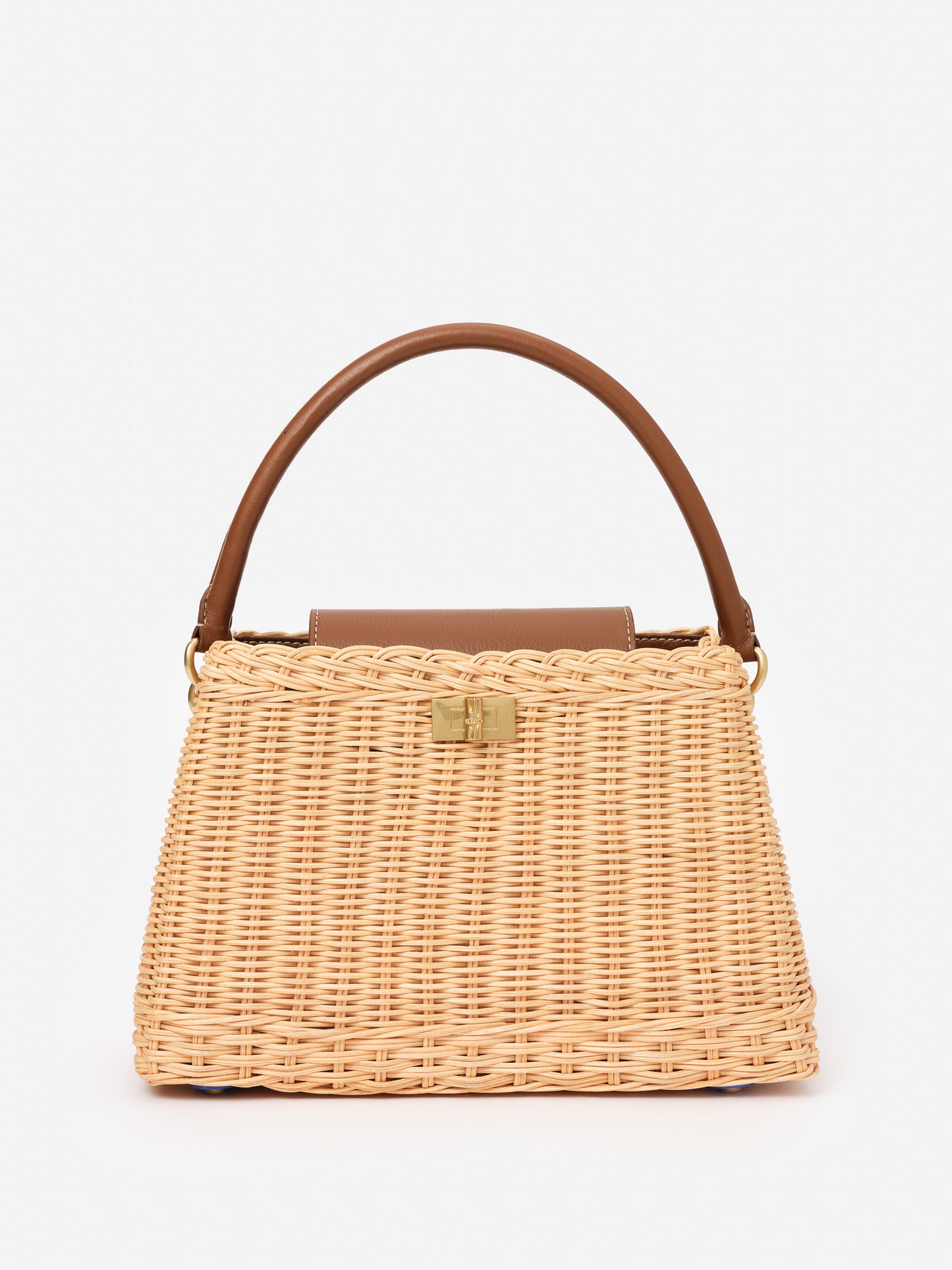 Faith Wicker Handbag by J.McLaughlin featuring a woven wicker body with a smooth brown leather handle and gold-tone clasp, blending effortlessly stylish design with enduring craftsmanship.