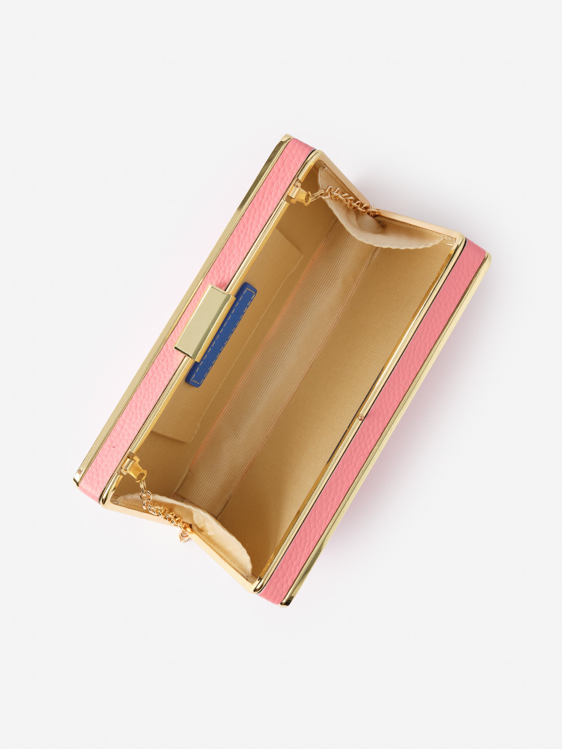Open pink and gold evening bag showcasing a sleek interior design with a delicate chain strap, exemplifying J.McLaughlin's legacy of timeless fashion and enduring designs in the Audra Acrylic Clutch.