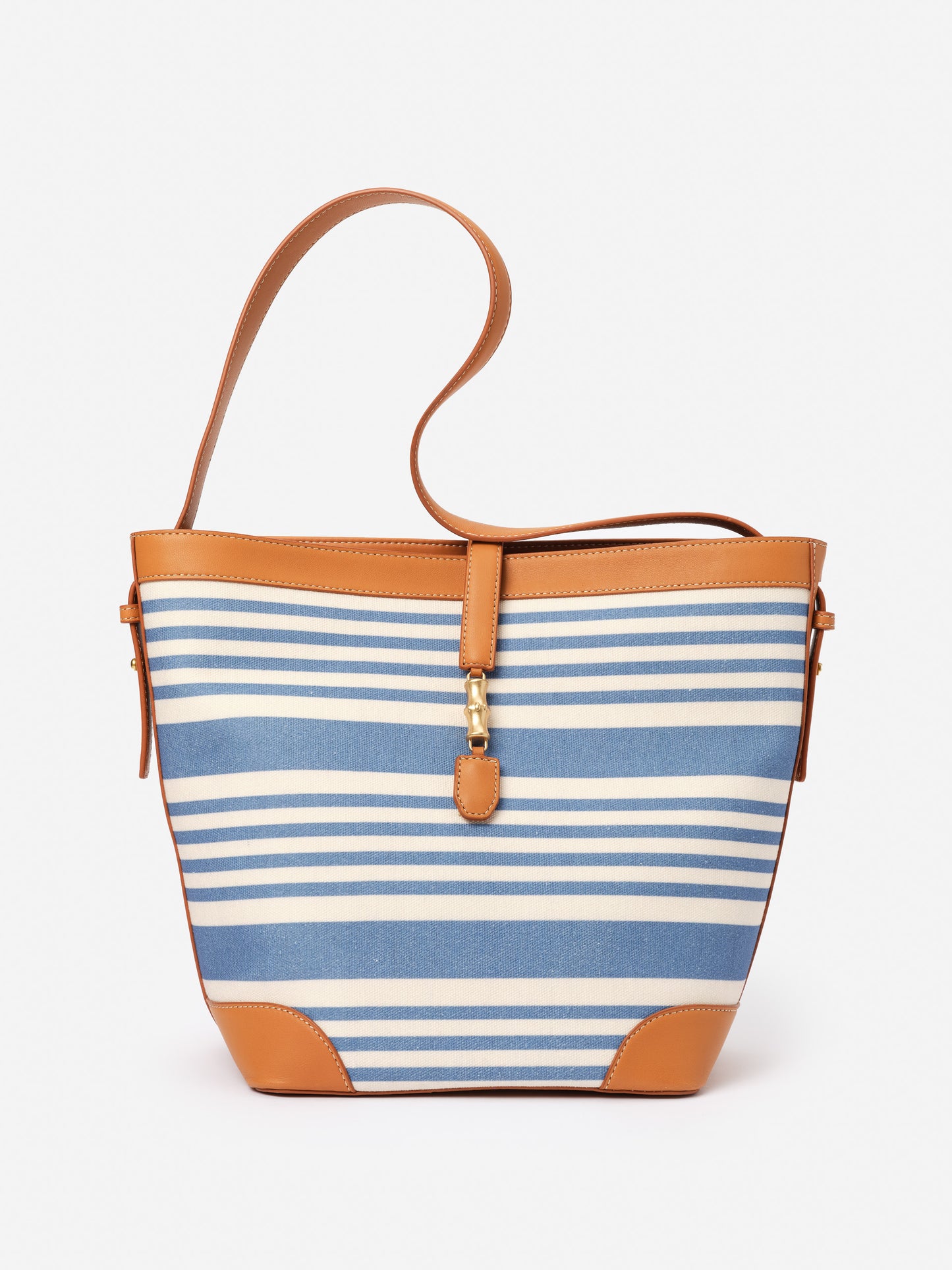 Crawford Handbag in Stripe by J.McLaughlin featuring blue and white stripes with tan leather trim, combining effortlessly stylish design and enduring craftsmanship for a life well-lived.