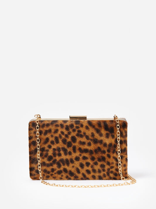 The Palm Pony Hair Clutch in Leopard by J.McLaughlin, featuring a chic leopard print pony hair design with a gold chain strap, perfect for stylish, timeless looks.