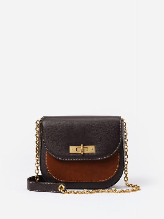 Waverly Leather Handbag by J.McLaughlin featuring mixed textures with a gold-tone chain strap, combining practicality and refined timeless style for effortless elegance.