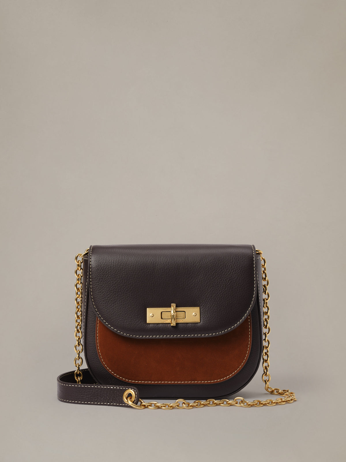 The Waverly Leather Handbag by J.McLaughlin in dark brown leather with mixed textures gold chain strap and polished clasp for refined everyday style