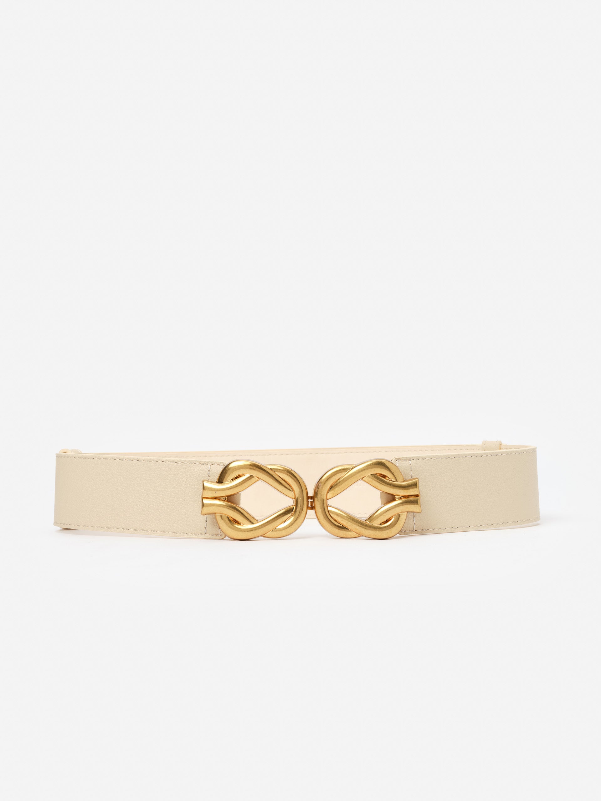 Eliza Belt by J.McLaughlin, featuring an effortlessly stylish beige strap and elegant gold buckle, exemplifies enduring designs in belts, crafted with innovative fabrics for a legacy of timeless fashion. A destination for defining style. Life, Well-Lived.