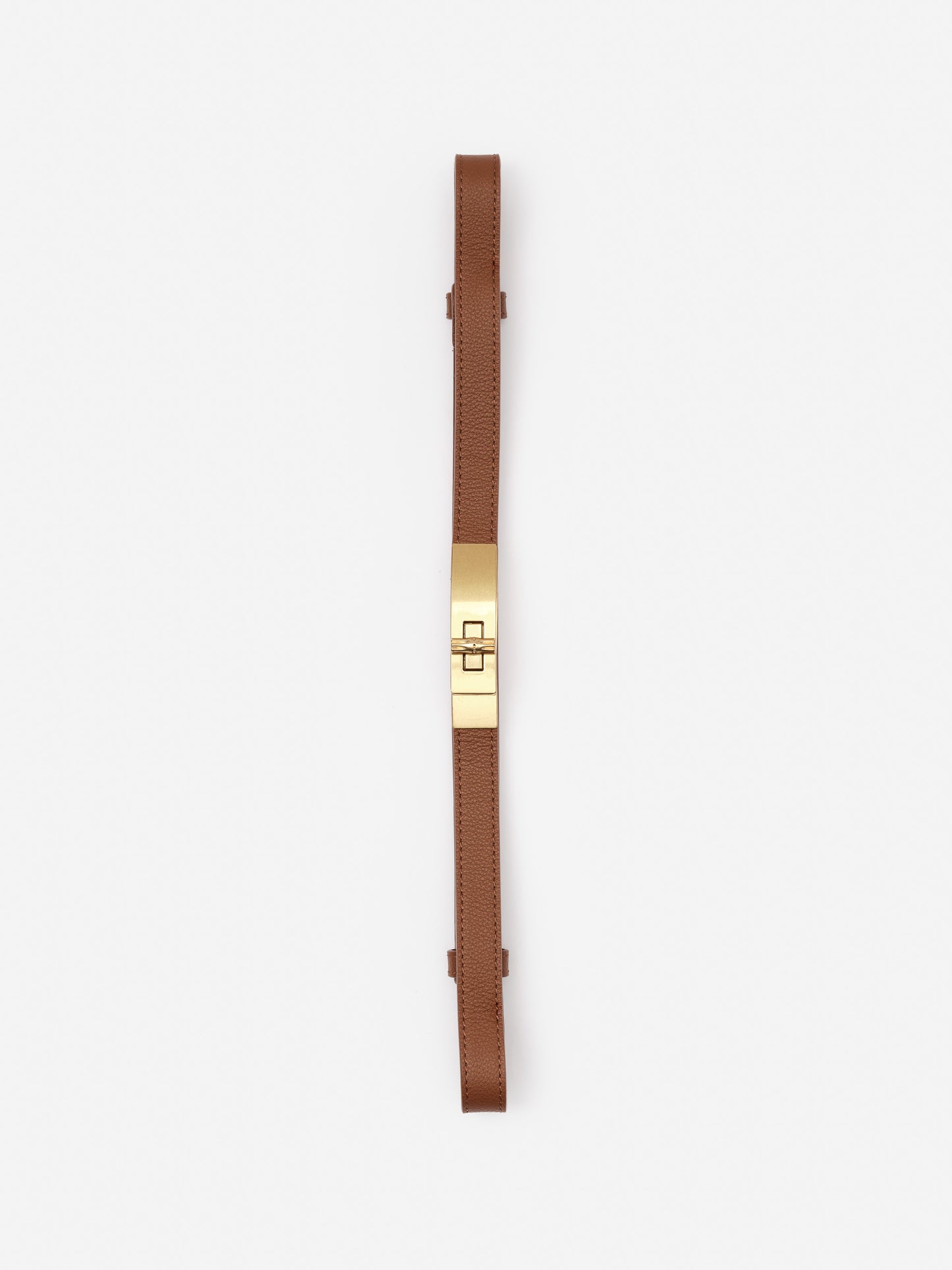 Liv Leather Belt in rich brown leather featuring a sleek gold-tone buckle by J.McLaughlin, combining effortlessly stylish, enduring designs with a legacy of timeless fashion.