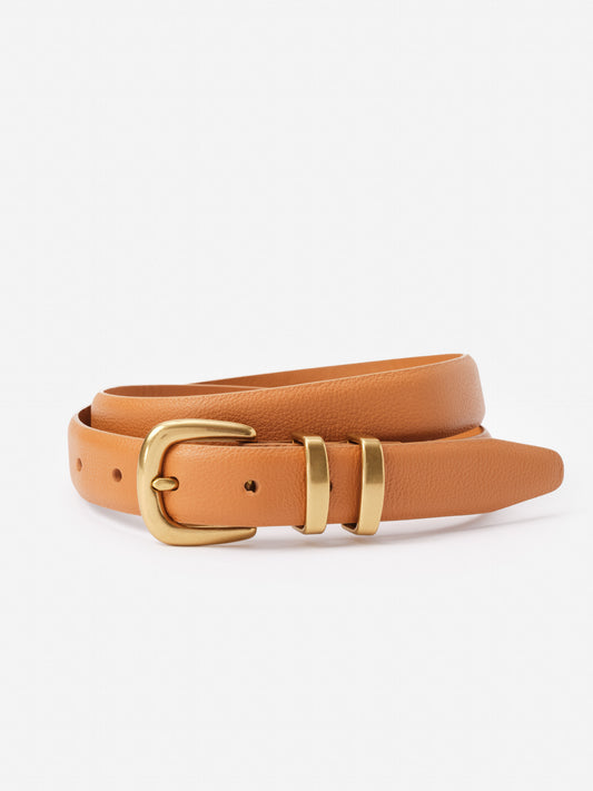 Khloe Leather Belt by J.McLaughlin features a classic tan leather design with gold-toned buckle accents, embodying effortlessly stylish and enduring designs, a destination for defining style. Life, Well-Lived.