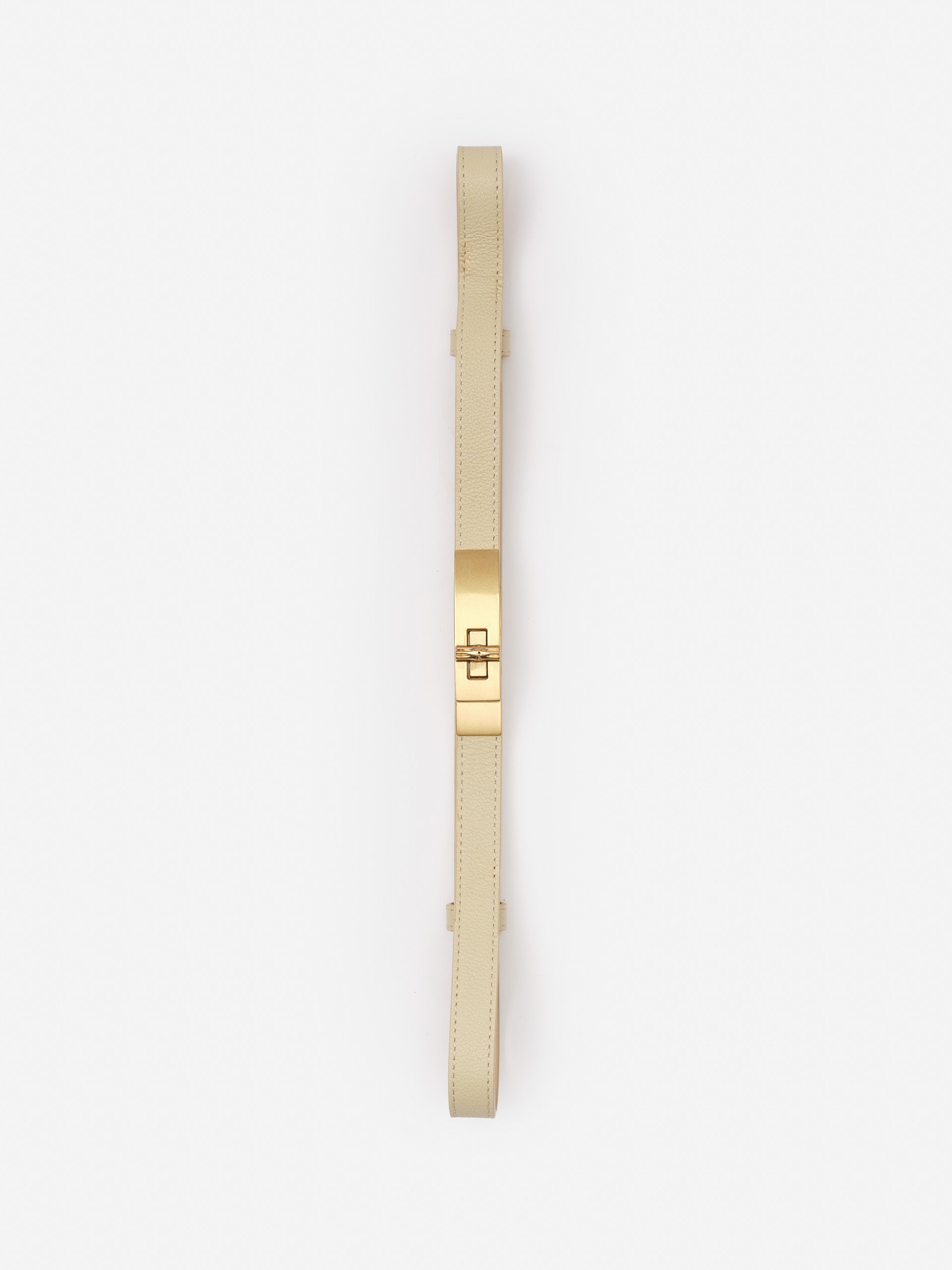 Liv Leather Belt by J.McLaughlin in a soft beige leather with a polished gold buckle, showcasing effortlessly stylish, enduring designs and innovative fabrics for a legacy of timeless fashion.
