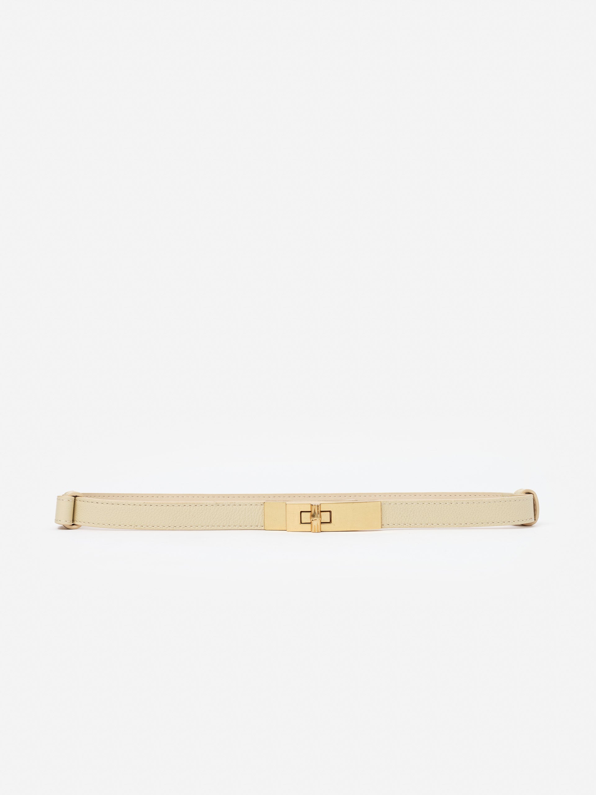 Elegant Liv Leather Belt in soft beige with gold-tone buckle from J.McLaughlin, showcasing effortlessly stylish, enduring designs with a legacy of timeless fashion. A destination for defining style. Life, Well-Lived.