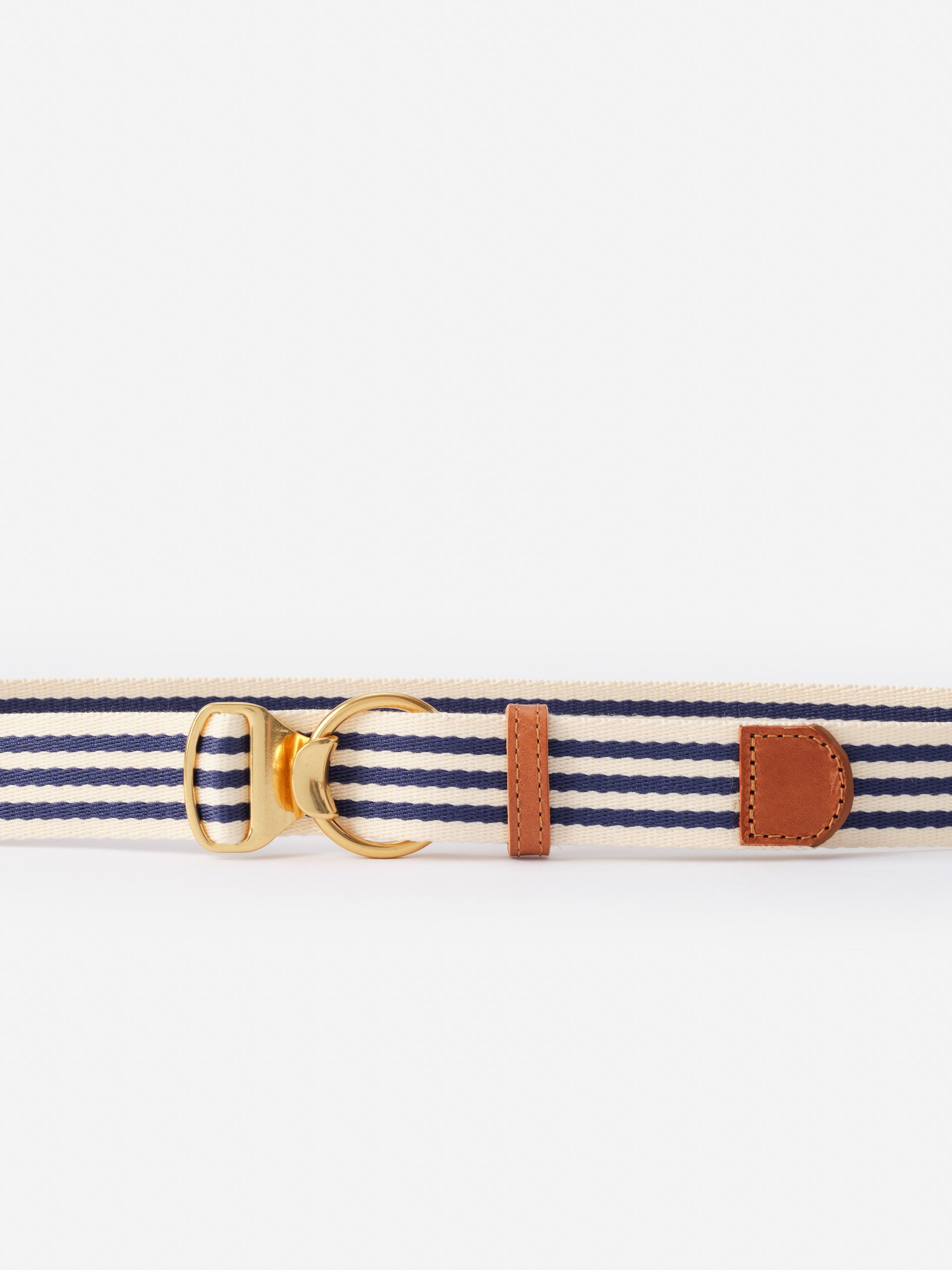 Mini Isobel Canvas Belt in Stripe by J.McLaughlin features navy and cream stripes with gold hardware and leather accents, offering effortlessly stylish, enduring designs and innovative fabrics.