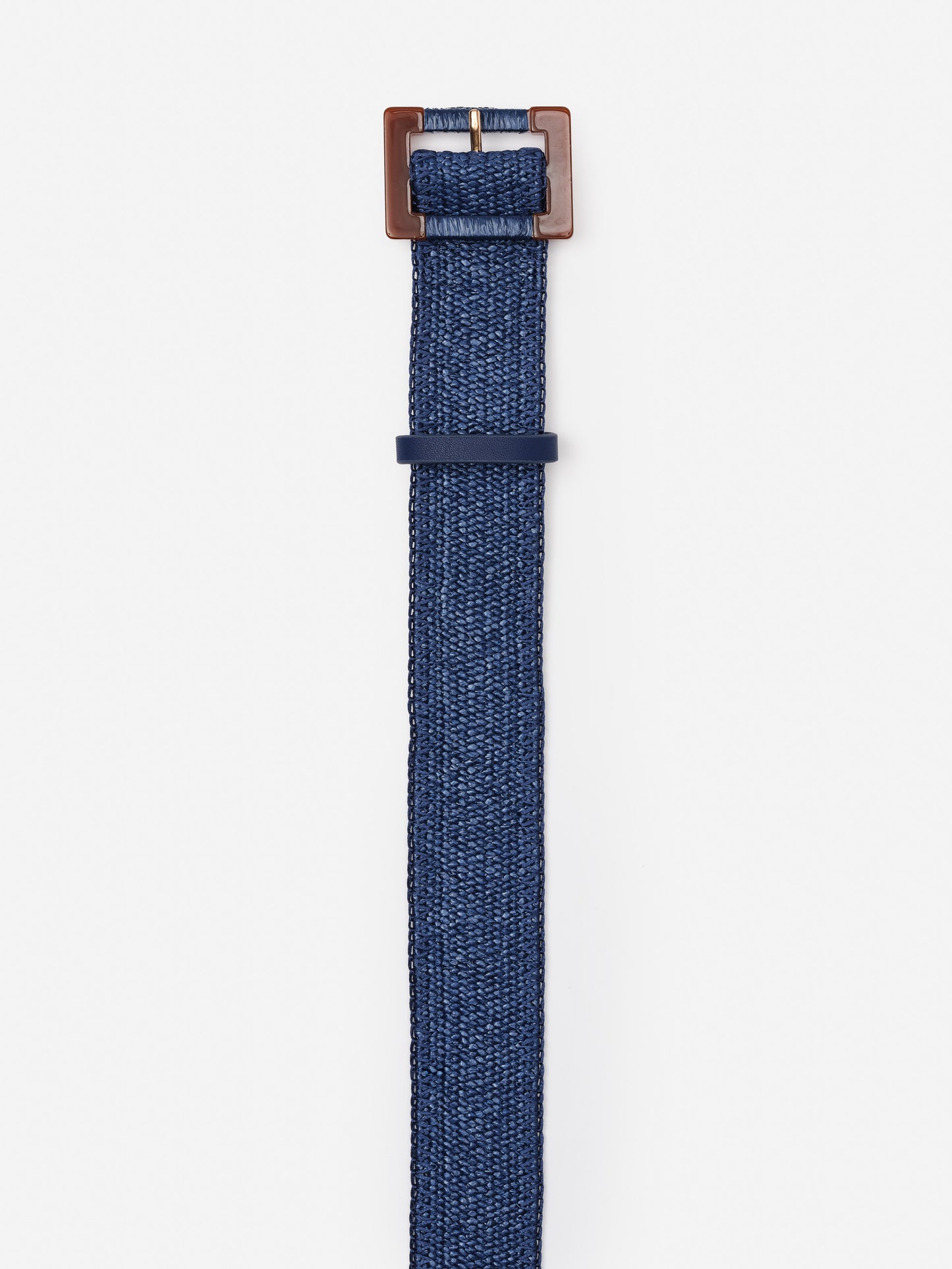 Margot Grasscloth Belt by J.McLaughlin in deep blue, showcasing an effortlessly stylish design crafted with innovative fabrics for enduring appeal and timeless fashion.