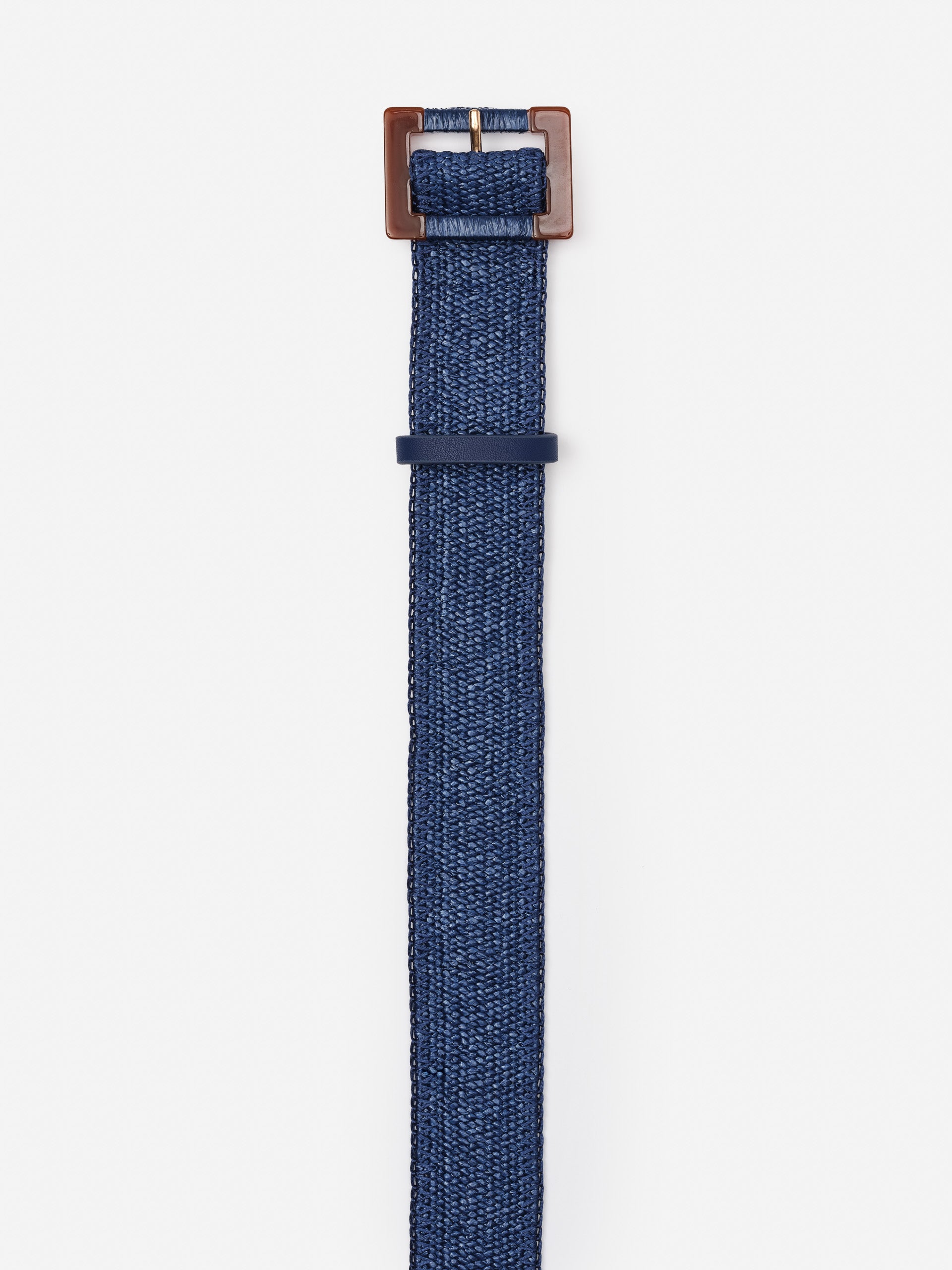 Margot Grasscloth Belt by J.McLaughlin in deep blue, showcasing an effortlessly stylish design crafted with innovative fabrics for enduring appeal and timeless fashion.