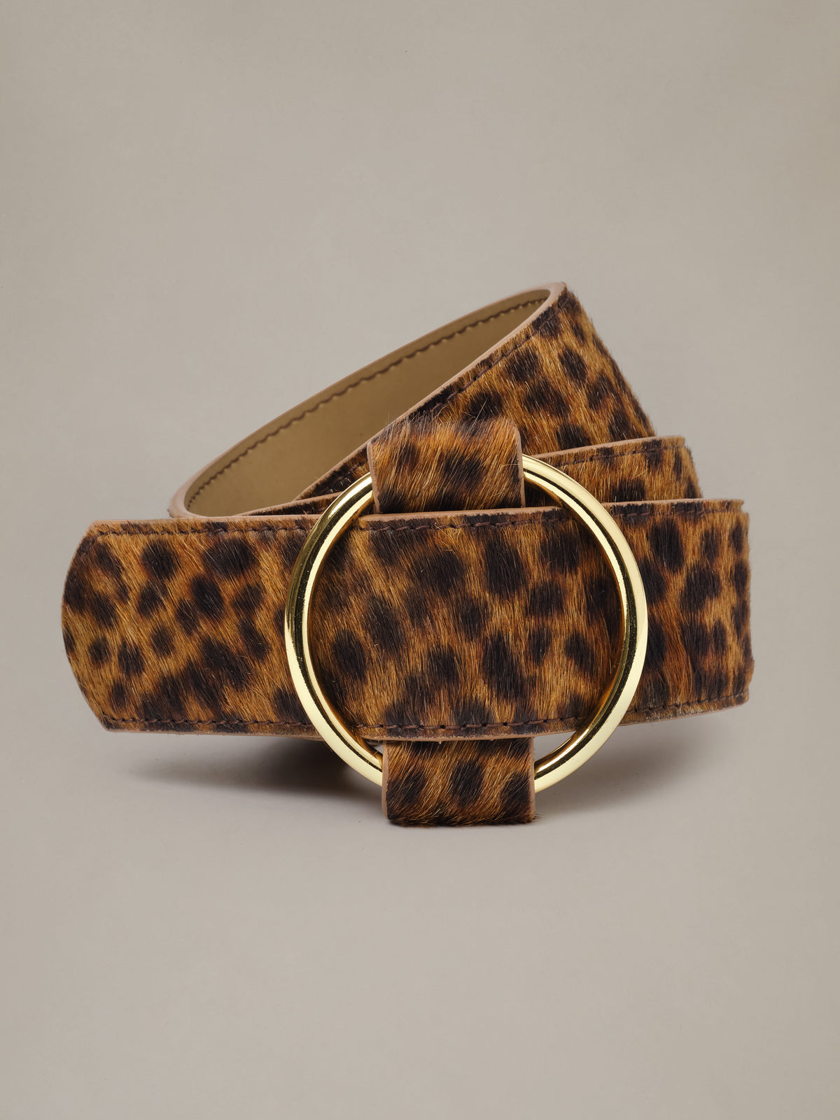 Amelia Pony Hair Belt in Leopard by J.McLaughlin featuring a wide leopard print pony hair design and smooth gold tone slide through buckle