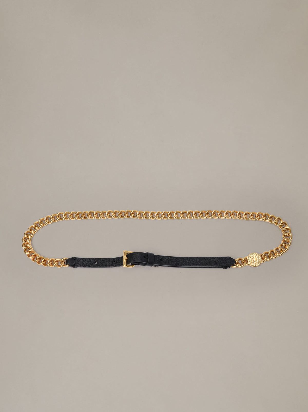 Nelly Chain Belt by J.McLaughlin featuring a black leather waist strap and polished gold chain links for a refined finish over dresses or jackets
