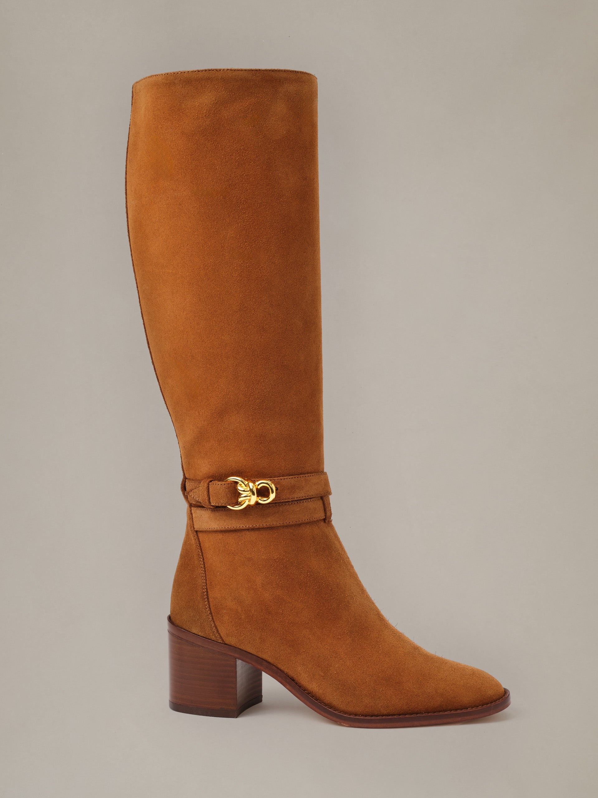 Addison Suede Boots by J.McLaughlin in rich cognac suede with a tall shaft stacked wooden heel and ankle strap with gold buckle
