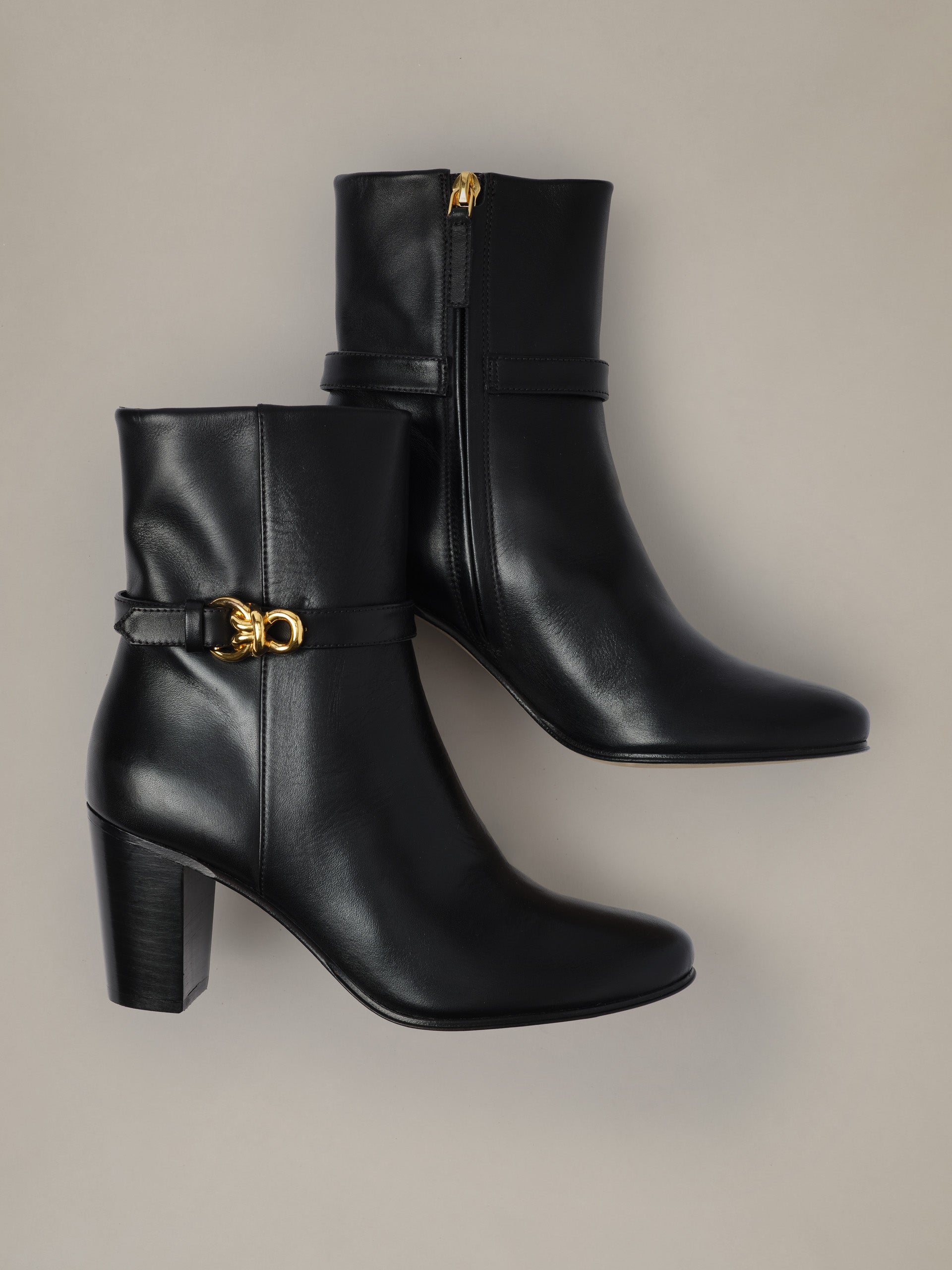Elle Leather Ankle Boots by J.McLaughlin in black leather with stacked heels and signature gold hardware