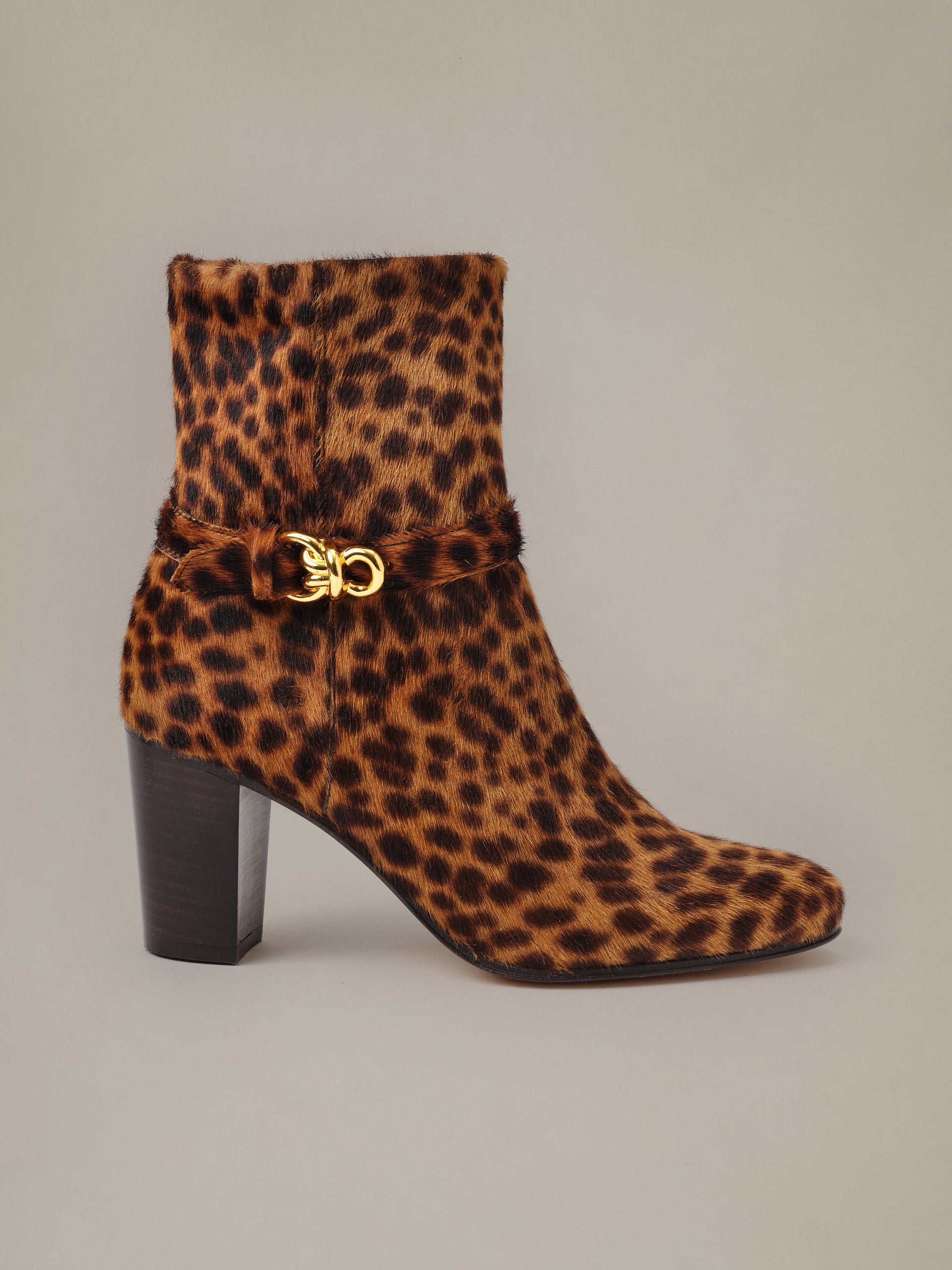 Elle Pony Hair Ankle Boots in Leopard by J.McLaughlin featuring a leopard print ankle boot with stacked heel and signature gold hardware