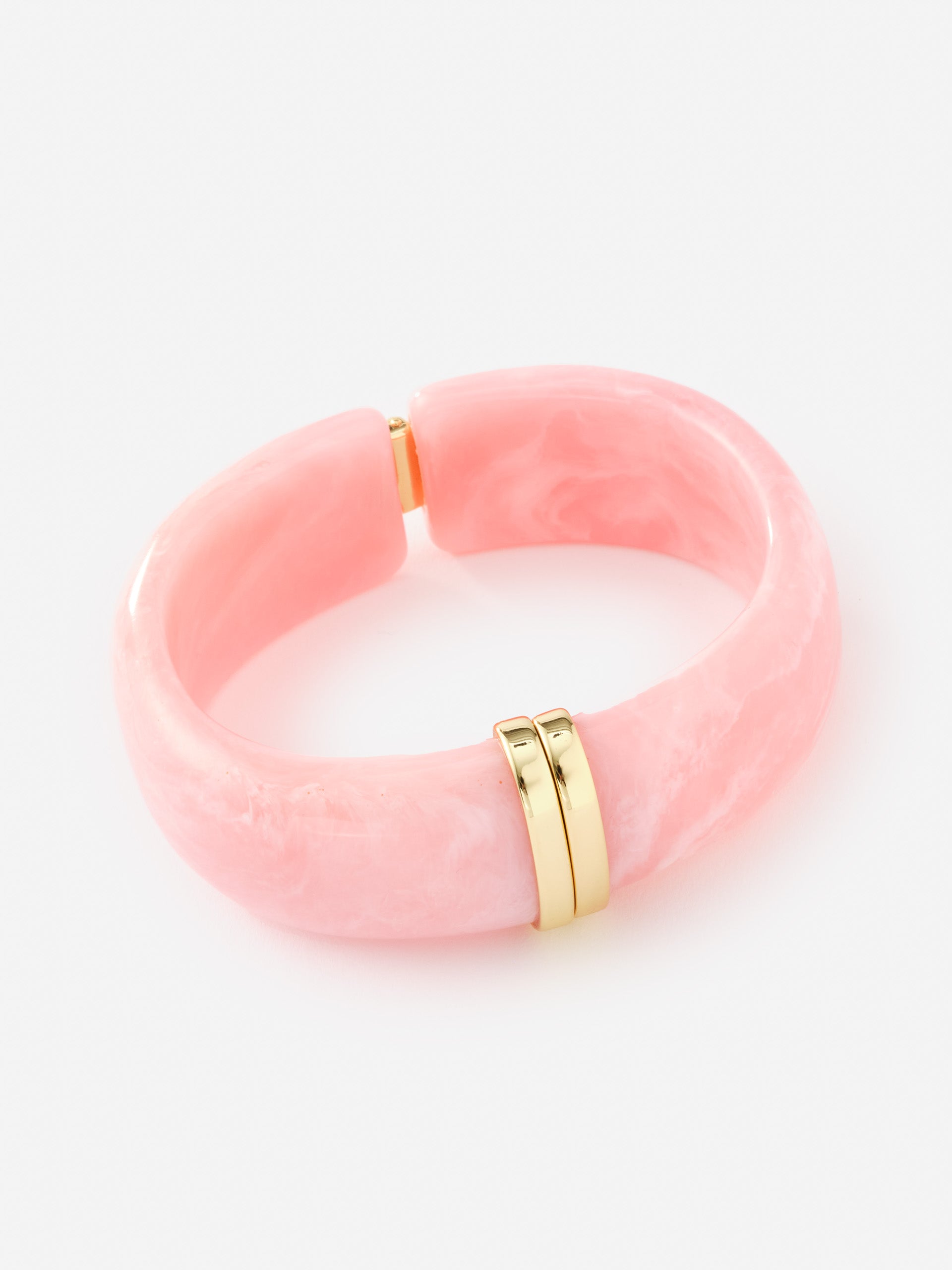 Resin Hinge Bangle in soft pink with gold-tone accents by J.McLaughlin, showcasing effortlessly stylish and enduring designs that define timeless fashion.
