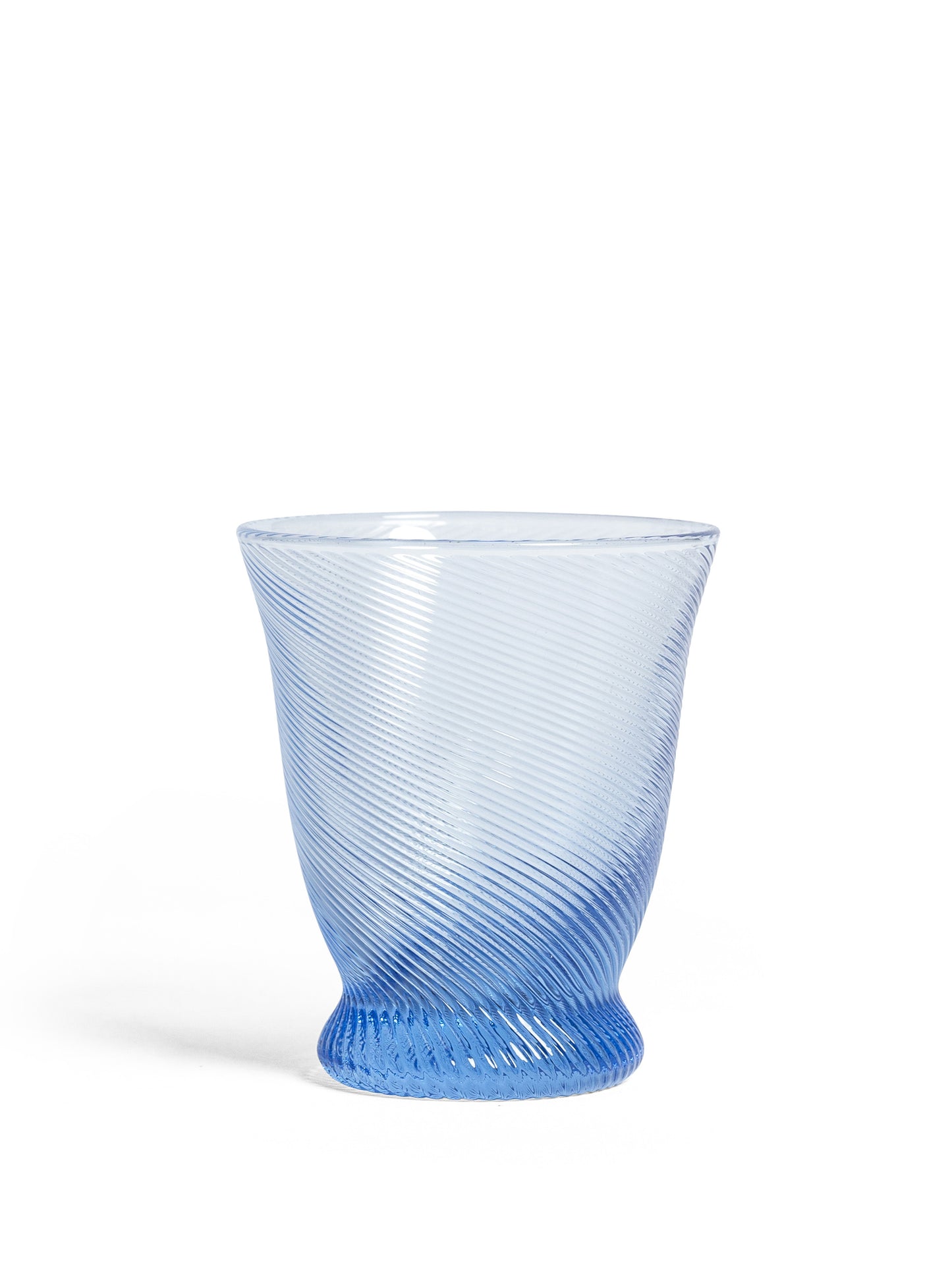 Blue textured glass tumbler with elegant spiral pattern, showcasing J.McLaughlin’s effortlessly stylish touch, featured in the Sharland England The Chic Hamper Gift Basket collection. A destination for defining style. Life, Well-Lived.