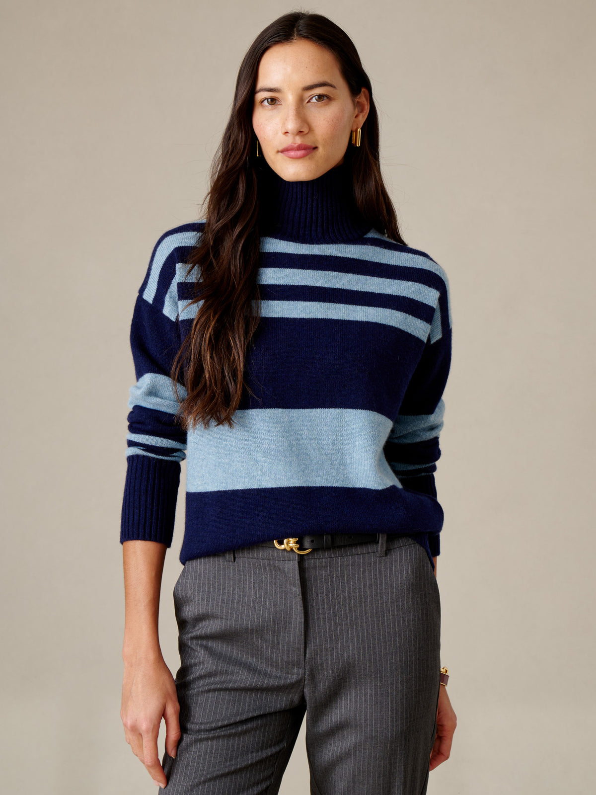 J.McLaughlin Dina Cashmere Turtleneck in Stripe worn with tailored gray pants for a timeless polished look