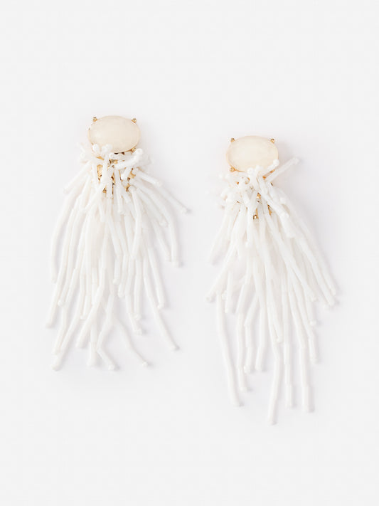 Beaded Tassel Earrings from J.McLaughlin feature white bead strands cascading from a smooth oval stone, embodying effortlessly stylish, enduring designs for a legacy of timeless fashion.