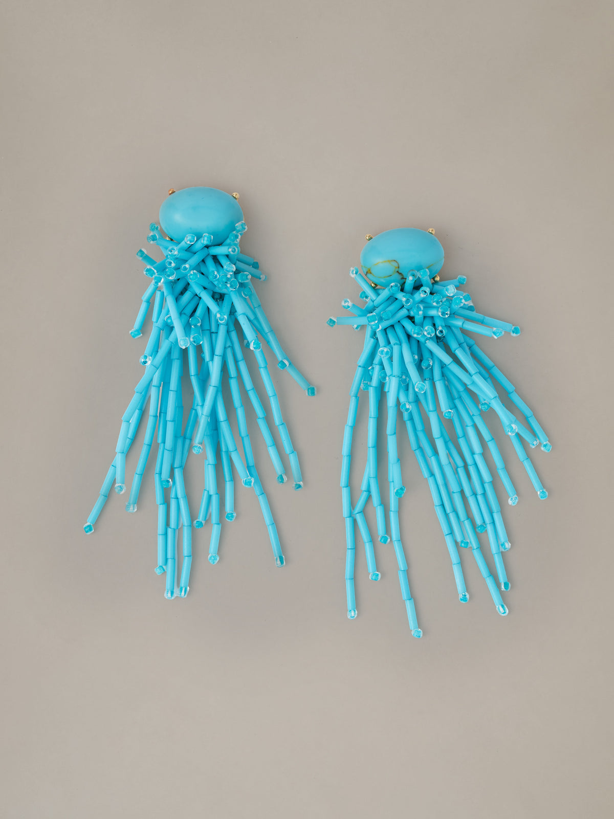 Beaded Tassel Earrings by J.McLaughlin featuring turquoise oval stones and cascading beaded tassels with graceful movement