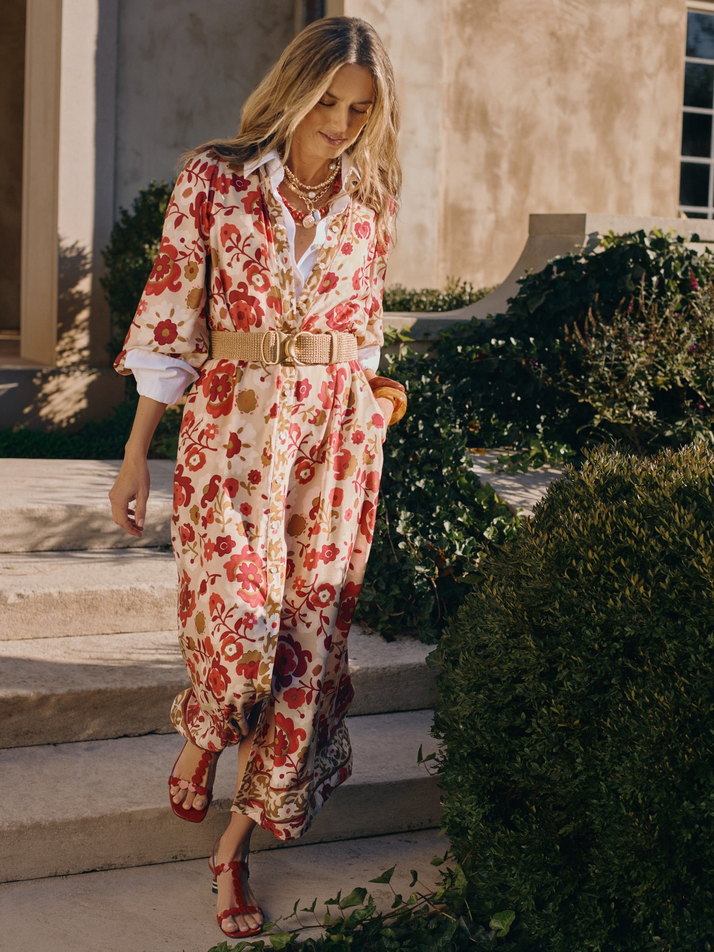 Woman wearing Serena Silk Blend Dress in Floral Daydream Frame by J.McLaughlin, styled with a belt and sandals, showcasing effortlessly stylish, enduring designs and innovative fabrics.