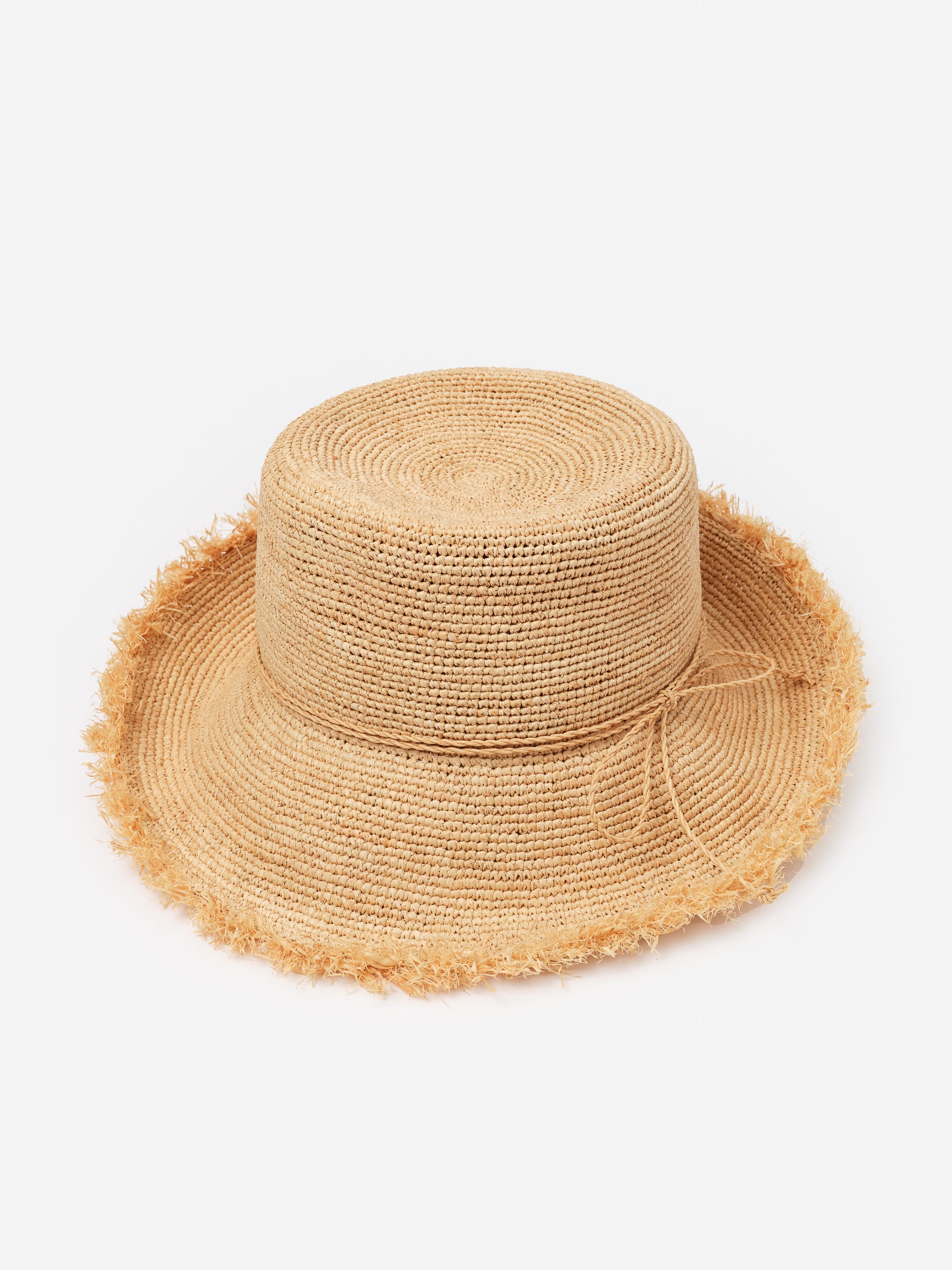 Anna Straw Hat by J.McLaughlin featuring an effortlessly stylish woven straw design with a frayed brim, embodying enduring designs and the legacy of timeless fashion.